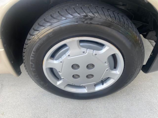 1995 Gold /Tan Saturn SL LOW MILES 70,805 (1G8ZH5282SZ) with an 1.9L 4-Cyl Engine engine, Automatic transmission, located at 4701 North Dixie Hwy, Pompano Beach, FL, 33064, (954) 422-2889, 26.240938, -80.123474 - OUR WEBPAGE FLORIDACARS1.COM HAS OVER 100 PHOTOS AND FREE CARFAX LINK 1995 SATURN S-SERIES SL1 ONE OF A KIND FIND DRIVES AMAZING VERY DEPENDABLE VIN: 1G8ZH5282SZ152130 1 G 8 Z H 5 2 8 2 S Z 1 5 2 1 3 0 SEDAN 4 DR 1.9L I4 F SOHC GASOLINE FRONT WHEEL DRIVE Features Air Conditioning AM/FM Stereo Automa - Photo#99