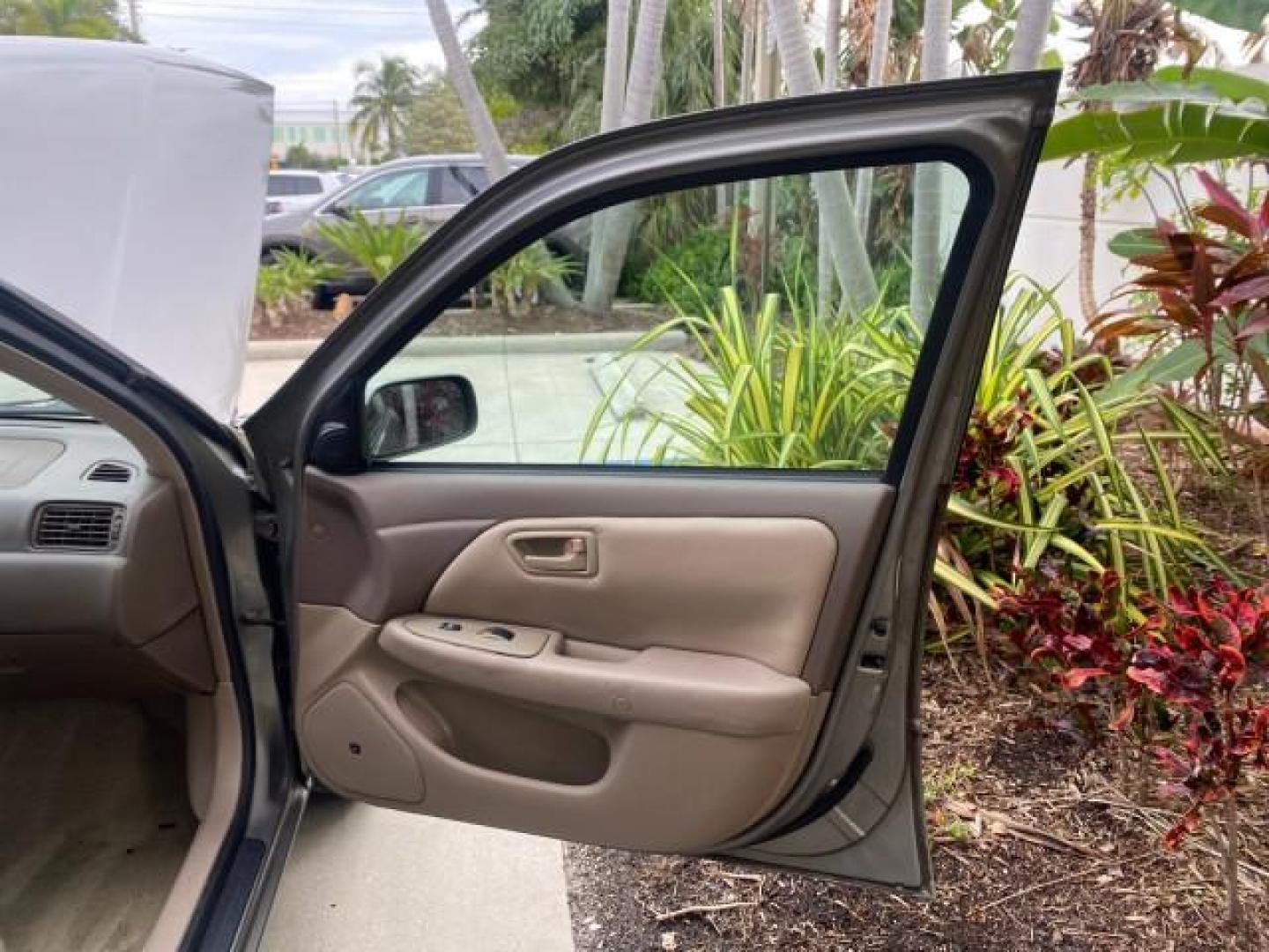 2000 Cashmere Beige Metallic /Oak Toyota Camry LE LOW MILES 63,706 SUNROOF (4T1BG22K1YU) with an 2.2L Twin-Cam EFI 16-Valve 4-Cyl Engine engine, Automatic transmission, located at 4701 North Dixie Hwy, Pompano Beach, FL, 33064, (954) 422-2889, 26.240938, -80.123474 - OUR WEBPAGE FLORIDACARS1.COM HAS OVER 100 PHOTOS AND FREE CARFAX LINK 2000 TOYOTA CAMRY LE LEATHER SUNROOF 4 CYNL LOADED ONE OF THE MOST DEPENDABLE CARS EVER BUILT VIN: 4T1BG22K1YU715920 4 T 1 B G 2 2 K 1 Y U 7 1 5 9 2 0 SEDAN 4 DR 2.2L I4 F 16V GASOLINE 30 MPG FRONT WHEEL DRIVE Features Air Conditi - Photo#11