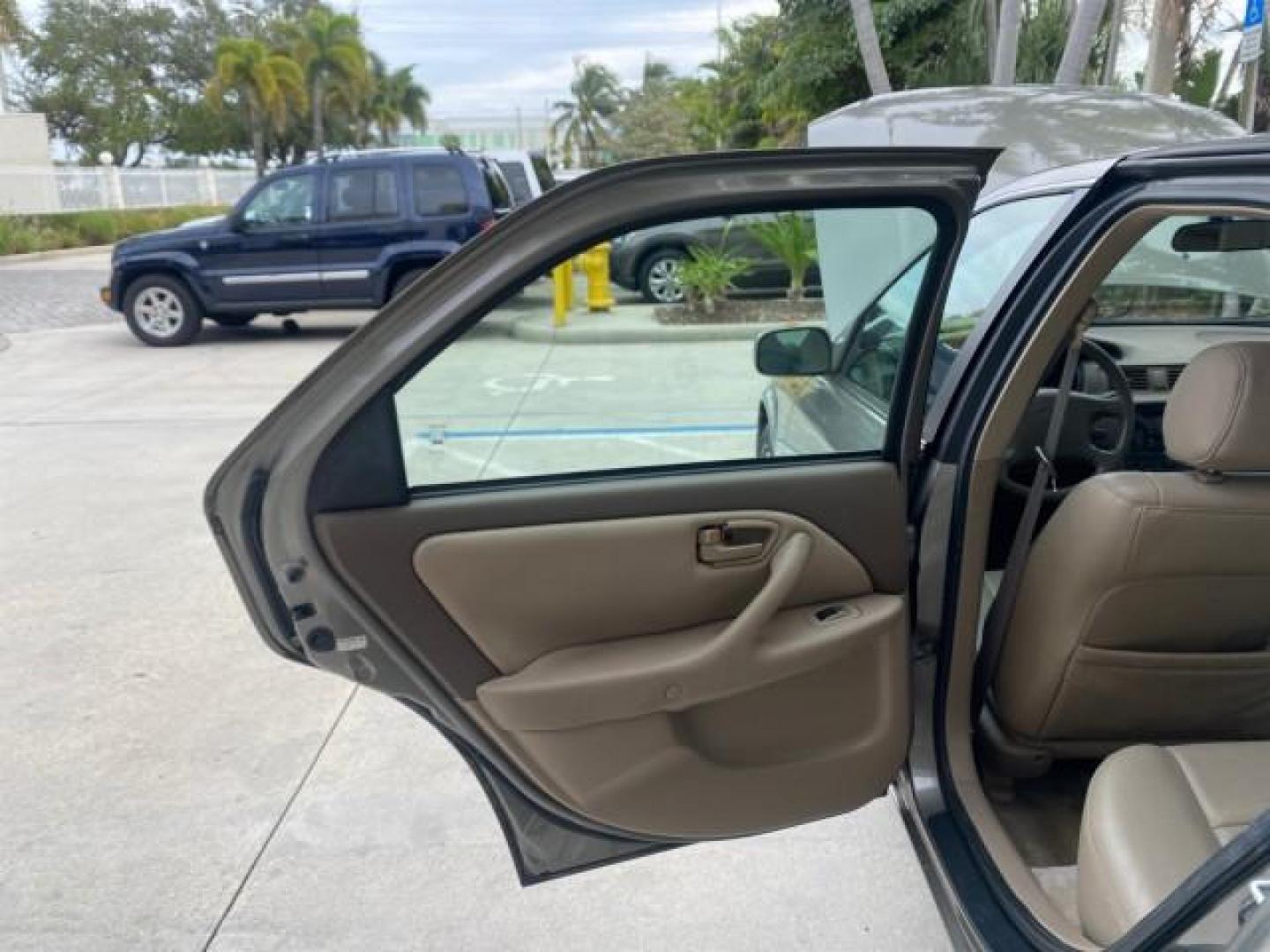 2000 Cashmere Beige Metallic /Oak Toyota Camry LE LOW MILES 63,706 SUNROOF (4T1BG22K1YU) with an 2.2L Twin-Cam EFI 16-Valve 4-Cyl Engine engine, Automatic transmission, located at 4701 North Dixie Hwy, Pompano Beach, FL, 33064, (954) 422-2889, 26.240938, -80.123474 - OUR WEBPAGE FLORIDACARS1.COM HAS OVER 100 PHOTOS AND FREE CARFAX LINK 2000 TOYOTA CAMRY LE LEATHER SUNROOF 4 CYNL LOADED ONE OF THE MOST DEPENDABLE CARS EVER BUILT VIN: 4T1BG22K1YU715920 4 T 1 B G 2 2 K 1 Y U 7 1 5 9 2 0 SEDAN 4 DR 2.2L I4 F 16V GASOLINE 30 MPG FRONT WHEEL DRIVE Features Air Conditi - Photo#13