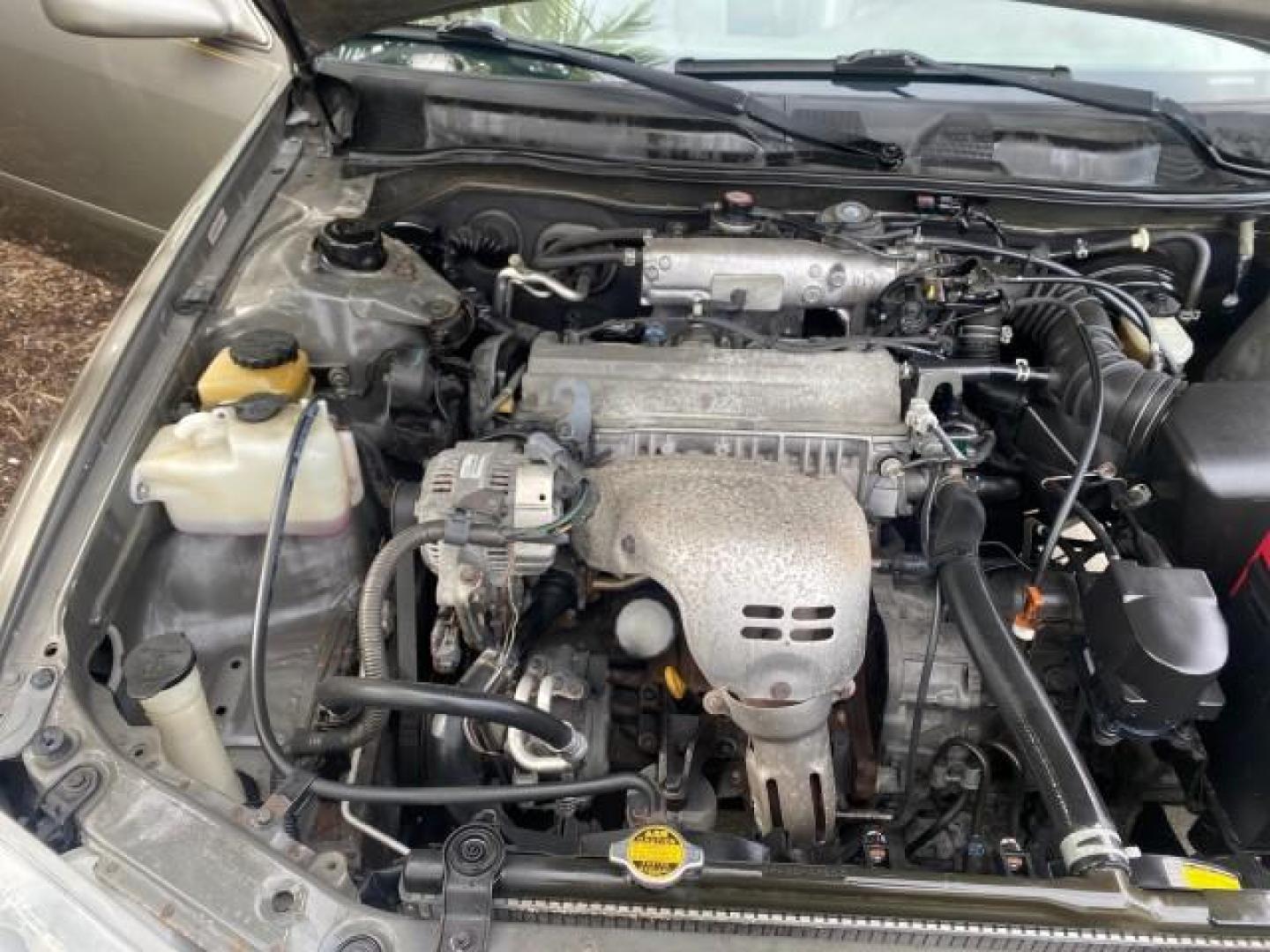 2000 Cashmere Beige Metallic /Oak Toyota Camry LE LOW MILES 63,706 SUNROOF (4T1BG22K1YU) with an 2.2L Twin-Cam EFI 16-Valve 4-Cyl Engine engine, Automatic transmission, located at 4701 North Dixie Hwy, Pompano Beach, FL, 33064, (954) 422-2889, 26.240938, -80.123474 - OUR WEBPAGE FLORIDACARS1.COM HAS OVER 100 PHOTOS AND FREE CARFAX LINK 2000 TOYOTA CAMRY LE LEATHER SUNROOF 4 CYNL LOADED ONE OF THE MOST DEPENDABLE CARS EVER BUILT VIN: 4T1BG22K1YU715920 4 T 1 B G 2 2 K 1 Y U 7 1 5 9 2 0 SEDAN 4 DR 2.2L I4 F 16V GASOLINE 30 MPG FRONT WHEEL DRIVE Features Air Conditi - Photo#25