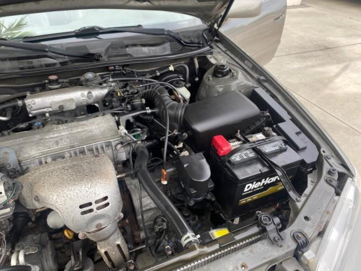 2000 Cashmere Beige Metallic /Oak Toyota Camry LE LOW MILES 63,706 SUNROOF (4T1BG22K1YU) with an 2.2L Twin-Cam EFI 16-Valve 4-Cyl Engine engine, Automatic transmission, located at 4701 North Dixie Hwy, Pompano Beach, FL, 33064, (954) 422-2889, 26.240938, -80.123474 - OUR WEBPAGE FLORIDACARS1.COM HAS OVER 100 PHOTOS AND FREE CARFAX LINK 2000 TOYOTA CAMRY LE LEATHER SUNROOF 4 CYNL LOADED ONE OF THE MOST DEPENDABLE CARS EVER BUILT VIN: 4T1BG22K1YU715920 4 T 1 B G 2 2 K 1 Y U 7 1 5 9 2 0 SEDAN 4 DR 2.2L I4 F 16V GASOLINE 30 MPG FRONT WHEEL DRIVE Features Air Conditi - Photo#26