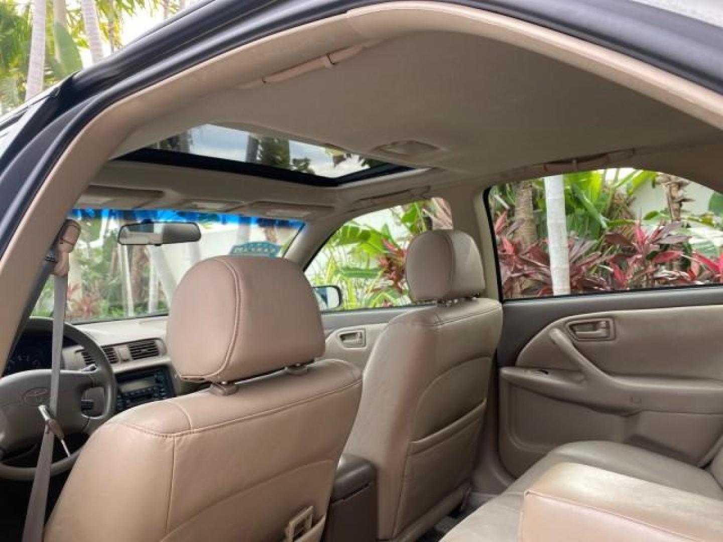 2000 Cashmere Beige Metallic /Oak Toyota Camry LE LOW MILES 63,706 SUNROOF (4T1BG22K1YU) with an 2.2L Twin-Cam EFI 16-Valve 4-Cyl Engine engine, Automatic transmission, located at 4701 North Dixie Hwy, Pompano Beach, FL, 33064, (954) 422-2889, 26.240938, -80.123474 - OUR WEBPAGE FLORIDACARS1.COM HAS OVER 100 PHOTOS AND FREE CARFAX LINK 2000 TOYOTA CAMRY LE LEATHER SUNROOF 4 CYNL LOADED ONE OF THE MOST DEPENDABLE CARS EVER BUILT VIN: 4T1BG22K1YU715920 4 T 1 B G 2 2 K 1 Y U 7 1 5 9 2 0 SEDAN 4 DR 2.2L I4 F 16V GASOLINE 30 MPG FRONT WHEEL DRIVE Features Air Conditi - Photo#73