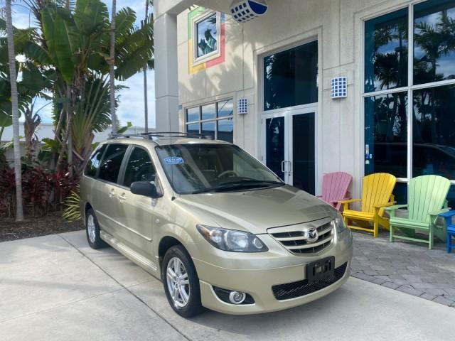 2004 Cosmic Sand Metallic /Beige/Black Mazda MPV LX LOW MILES 62,740 (JM3LW28J340) with an 3.0L DOHC MPFI 24-Valve V6 Engine engine, Automatic transmission, located at 4701 North Dixie Hwy, Pompano Beach, FL, 33064, (954) 422-2889, 26.240938, -80.123474 - OUR WEBPAGE FLORIDACARS1.COM HAS OVER 100 PHOTOS AND FREE CARFAX LINK 2004 MAZDA MPV LX VIN: JM3LW28J340519237 J M 3 L W 2 8 J 3 4 0 5 1 9 2 3 7 VAN 3.0L V6 F GASOLINE 25 MPG FRONT WHEEL DRIVE Features ABS Brakes Air Conditioning Alloy Wheels AM/FM Stereo Automatic Transmission CD Audio Cloth Seats - Photo#1