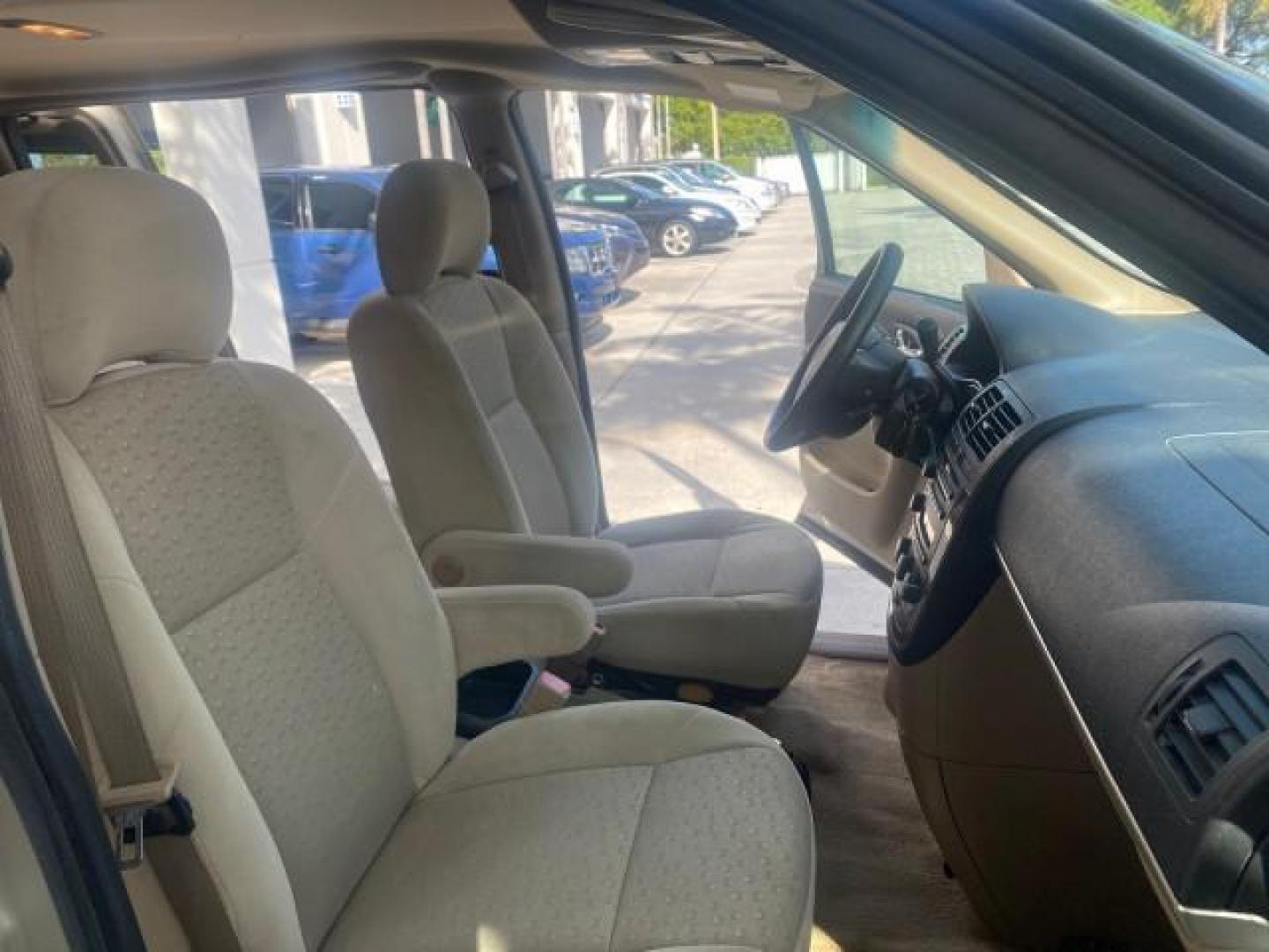 2007 Gold Mist Metallic /Cashmere Chevrolet Uplander LS LOW MILES 46,982 VAN (1GNDV23137D) with an 3.9L V6 SFI Engine engine, Automatic transmission, located at 4701 North Dixie Hwy, Pompano Beach, FL, 33064, (954) 422-2889, 26.240938, -80.123474 - OUR WEBPAGE FLORIDACARS1.COM HAS OVER 100 PHOTOS AND FREE CARFAX LINK 2007 CHEVROLET UPLANDER LS 7 PASSENGER VIN: 1GNDV23137D200271 1 G N D V 2 3 1 3 7 D 2 0 0 2 7 1 VAN 3.9L V6 F GASOLINE 25 MPG FRONT WHEEL DRIVE Features ABS Brakes Air Conditioning Alloy Wheels AM/FM Stereo Automatic Transmission- Photo#12