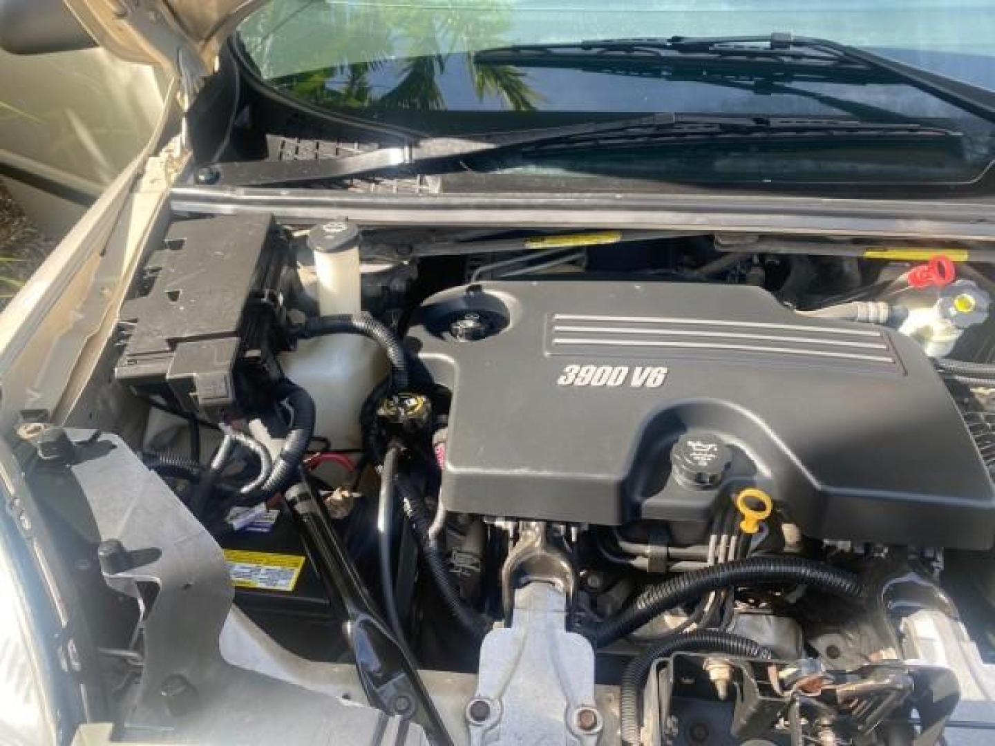 2007 Gold Mist Metallic /Cashmere Chevrolet Uplander LS LOW MILES 46,982 VAN (1GNDV23137D) with an 3.9L V6 SFI Engine engine, Automatic transmission, located at 4701 North Dixie Hwy, Pompano Beach, FL, 33064, (954) 422-2889, 26.240938, -80.123474 - OUR WEBPAGE FLORIDACARS1.COM HAS OVER 100 PHOTOS AND FREE CARFAX LINK 2007 CHEVROLET UPLANDER LS 7 PASSENGER VIN: 1GNDV23137D200271 1 G N D V 2 3 1 3 7 D 2 0 0 2 7 1 VAN 3.9L V6 F GASOLINE 25 MPG FRONT WHEEL DRIVE Features ABS Brakes Air Conditioning Alloy Wheels AM/FM Stereo Automatic Transmission- Photo#24