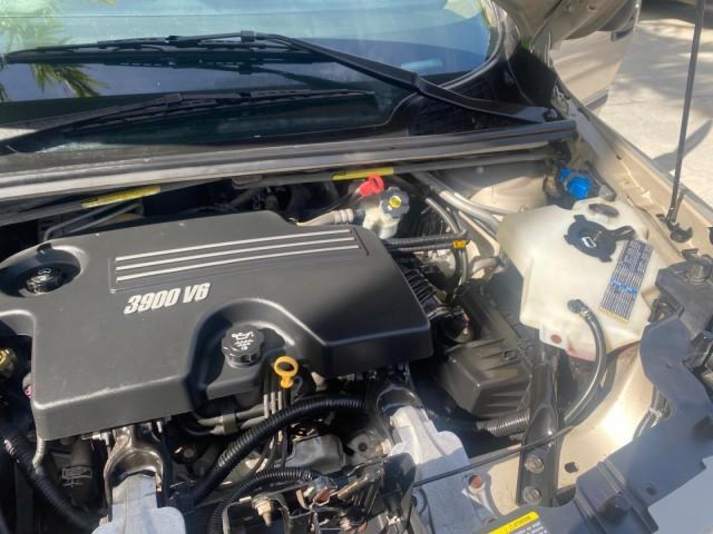 2007 Gold Mist Metallic /Cashmere Chevrolet Uplander LS LOW MILES 46,982 VAN (1GNDV23137D) with an 3.9L V6 SFI Engine engine, Automatic transmission, located at 4701 North Dixie Hwy, Pompano Beach, FL, 33064, (954) 422-2889, 26.240938, -80.123474 - OUR WEBPAGE FLORIDACARS1.COM HAS OVER 100 PHOTOS AND FREE CARFAX LINK 2007 CHEVROLET UPLANDER LS 7 PASSENGER VIN: 1GNDV23137D200271 1 G N D V 2 3 1 3 7 D 2 0 0 2 7 1 VAN 3.9L V6 F GASOLINE 25 MPG FRONT WHEEL DRIVE Features ABS Brakes Air Conditioning Alloy Wheels AM/FM Stereo Automatic Transmission- Photo#25