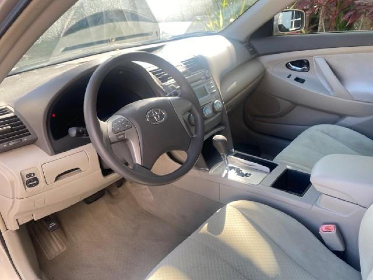 2007 Desert Sand Mica /Bisque Toyota Camry LE LOW MILES 44,042 1 OWNER (4T1BE46K77U) with an 2.4L DOHC MPFI VVT-i 16-Valve 4-Cyl Engine engine, Automatic transmission, located at 4701 North Dixie Hwy, Pompano Beach, FL, 33064, (954) 422-2889, 26.240938, -80.123474 - OUR WEBPAGE FLORIDACARS1.COM HAS OVER 100 PHOTOS AND FREE CARFAX LINK 2007 TOYOTA CAMRY LE VIN: 4T1BE46K77U636309 4 T 1 B E 4 6 K 7 7 U 6 3 6 3 0 9 SEDAN 4 DR 2.4L I4 F DOHC 16V GASOLINE 31 MPG FRONT WHEEL DRIVE Features ABS Brakes Air Conditioning AM/FM Stereo Automatic Transmission Auxiliary Audio - Photo#46