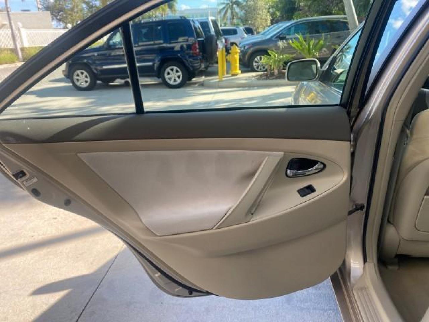 2007 Desert Sand Mica /Bisque Toyota Camry LE LOW MILES 44,042 1 OWNER (4T1BE46K77U) with an 2.4L DOHC MPFI VVT-i 16-Valve 4-Cyl Engine engine, Automatic transmission, located at 4701 North Dixie Hwy, Pompano Beach, FL, 33064, (954) 422-2889, 26.240938, -80.123474 - OUR WEBPAGE FLORIDACARS1.COM HAS OVER 100 PHOTOS AND FREE CARFAX LINK 2007 TOYOTA CAMRY LE VIN: 4T1BE46K77U636309 4 T 1 B E 4 6 K 7 7 U 6 3 6 3 0 9 SEDAN 4 DR 2.4L I4 F DOHC 16V GASOLINE 31 MPG FRONT WHEEL DRIVE Features ABS Brakes Air Conditioning AM/FM Stereo Automatic Transmission Auxiliary Audio - Photo#69
