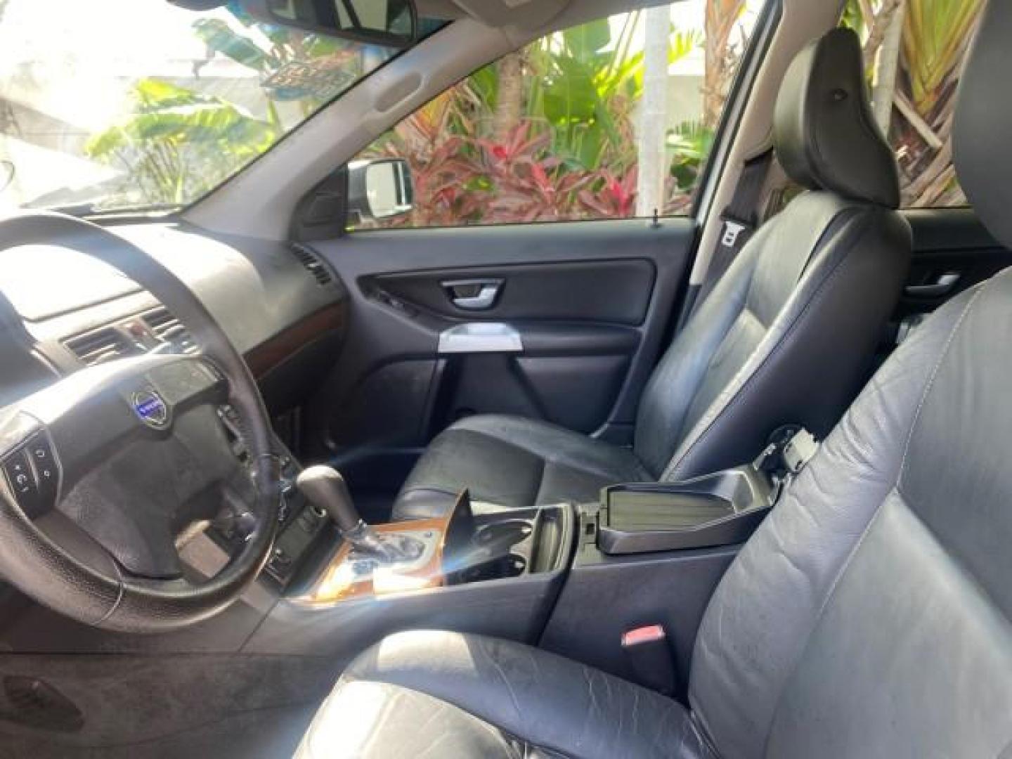 2006 Silver Metallic /Graphite Volvo XC90 SUV Turbo LOW MILES 55,260 1 OWNER FL (YV4CY592561) with an 2.5L Turbocharged I5 Engine engine, Automatic transmission, located at 4701 North Dixie Hwy, Pompano Beach, FL, 33064, (954) 422-2889, 26.240938, -80.123474 - OUR WEBPAGE FLORIDACARS1.COM HAS OVER 100 PHOTOS AND FREE CARFAX LINK 2006 VOLVO XC90 2.5T 1 OWNER FL SUNROOF LEATHER FULLY LOADED VIN: YV4CY592561248414 Y V 4 C Y 5 9 2 5 6 1 2 4 8 4 1 4 4 DOOR WAGON/SPORT UTILITY 2.5L I5 F GASOLINE 23 MPG FRONT WHEEL DRIVE Features ABS Brakes Air Conditioning Allo- Photo#43