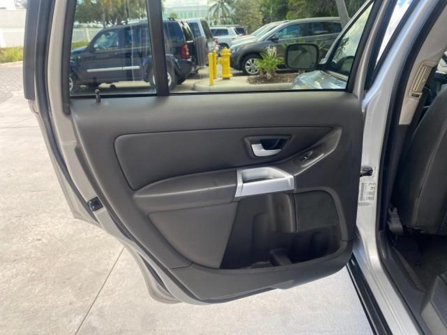 2006 Silver Metallic /Graphite Volvo XC90 SUV Turbo LOW MILES 55,260 1 OWNER FL (YV4CY592561) with an 2.5L Turbocharged I5 Engine engine, Automatic transmission, located at 4701 North Dixie Hwy, Pompano Beach, FL, 33064, (954) 422-2889, 26.240938, -80.123474 - OUR WEBPAGE FLORIDACARS1.COM HAS OVER 100 PHOTOS AND FREE CARFAX LINK 2006 VOLVO XC90 2.5T 1 OWNER FL SUNROOF LEATHER FULLY LOADED VIN: YV4CY592561248414 Y V 4 C Y 5 9 2 5 6 1 2 4 8 4 1 4 4 DOOR WAGON/SPORT UTILITY 2.5L I5 F GASOLINE 23 MPG FRONT WHEEL DRIVE Features ABS Brakes Air Conditioning Allo- Photo#67