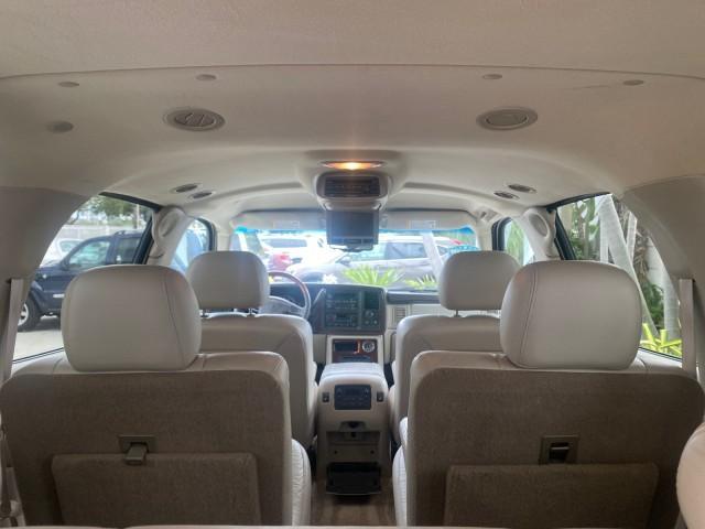 2003 White Diamond /Pewter Cadillac Escalade ESV 4WD/AWD (3GYFK66N23G) with an 6.0L Vortec 6000 High-Output V8 SFI Engine engine, Automatic transmission, located at 4701 North Dixie Hwy, Pompano Beach, FL, 33064, (954) 422-2889, 26.240938, -80.123474 - OUR WEBPAGE FLORIDACARS1.COM HAS OVER 100 PHOTOS AND FREE CARFAX LINK 2003 CADILLAC ESCALADE ESV VIN: 3GYFK66N23G235178 3 G Y F K 6 6 N 2 3 G 2 3 5 1 7 8 4 DOOR WAGON/SPORT UTILITY 6.0L V8 F GASOLINE 17 MPG ALL WHEEL DRIVE Features 4WD/AWD ABS Brakes Air Conditioning Alloy Wheels AM/FM Stereo Automa - Photo#94