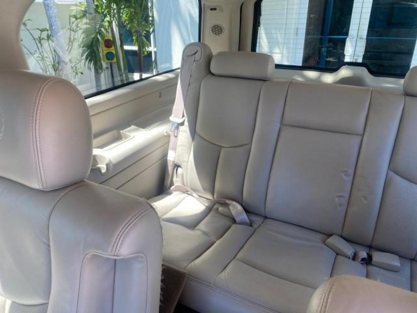 2003 White Diamond /Pewter Cadillac Escalade ESV SUV PEARL WHITE 4WD/AWD (3GYFK66N23G) with an 6.0L Vortec 6000 High-Output V8 SFI Engine engine, Automatic transmission, located at 4701 North Dixie Hwy, Pompano Beach, FL, 33064, (954) 422-2889, 26.240938, -80.123474 - OUR WEBPAGE FLORIDACARS1.COM HAS OVER 100 PHOTOS AND FREE CARFAX LINK 2003 CADILLAC ESCALADE ESV VIN: 3GYFK66N23G235178 3 G Y F K 6 6 N 2 3 G 2 3 5 1 7 8 4 DOOR WAGON/SPORT UTILITY 6.0L V8 F GASOLINE 17 MPG ALL WHEEL DRIVE Features 4WD/AWD ABS Brakes Air Conditioning Alloy Wheels AM/FM Stereo Automa - Photo#91