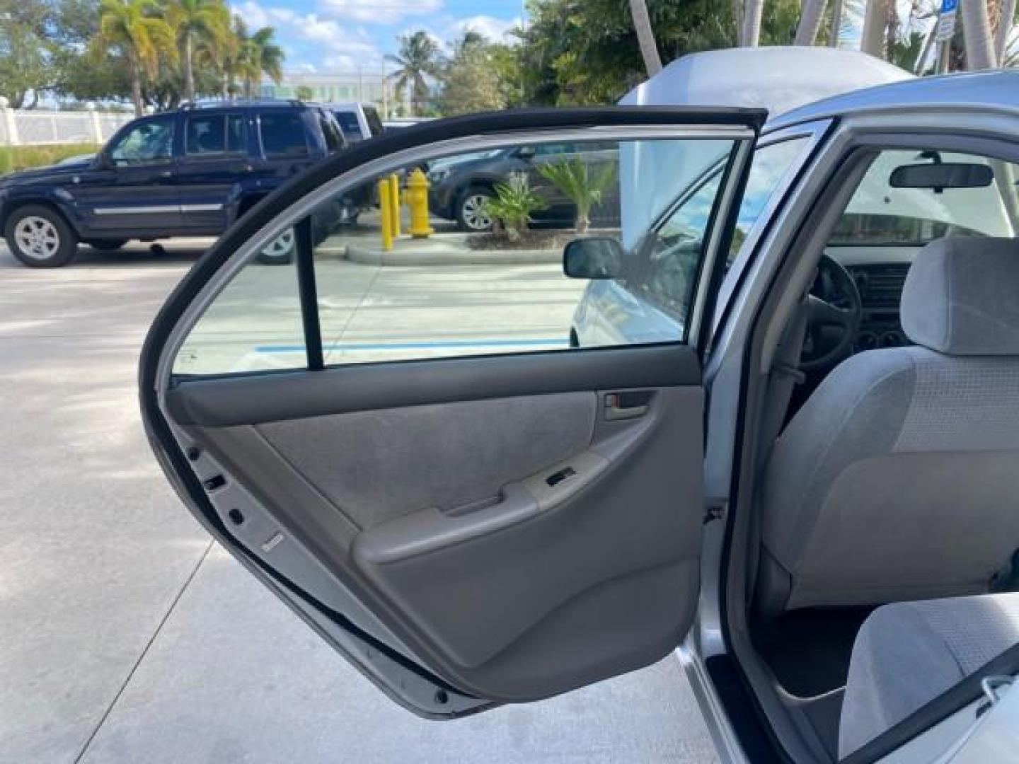 2007 Silver Streak Mica /Stone Toyota Corolla LOADED LOW MILES 11,867 1 OWNER (1NXBR32E07Z) with an 1.8L DOHC SFI 16-Valve VVT-i 4-Cyl Engine engine, Automatic transmission, located at 4701 North Dixie Hwy, Pompano Beach, FL, 33064, (954) 422-2889, 26.240938, -80.123474 - OUR WEBPAGE FLORIDACARS1.COM HAS OVER 100 PHOTOS AND FREE CARFAX LINK 2007 TOYOTA COROLLA CE HAS EVERY OPTION AS A LE - FULLY LOADED VIN: 1NXBR32E07Z816925 1 N X B R 3 2 E 0 7 Z 8 1 6 9 2 5 SEDAN 4 DR 1.8L I4 F DOHC 16V GASOLINE 41 MPG FRONT WHEEL DRIVE Features Air Conditioning AM/FM Stereo Automat - Photo#13