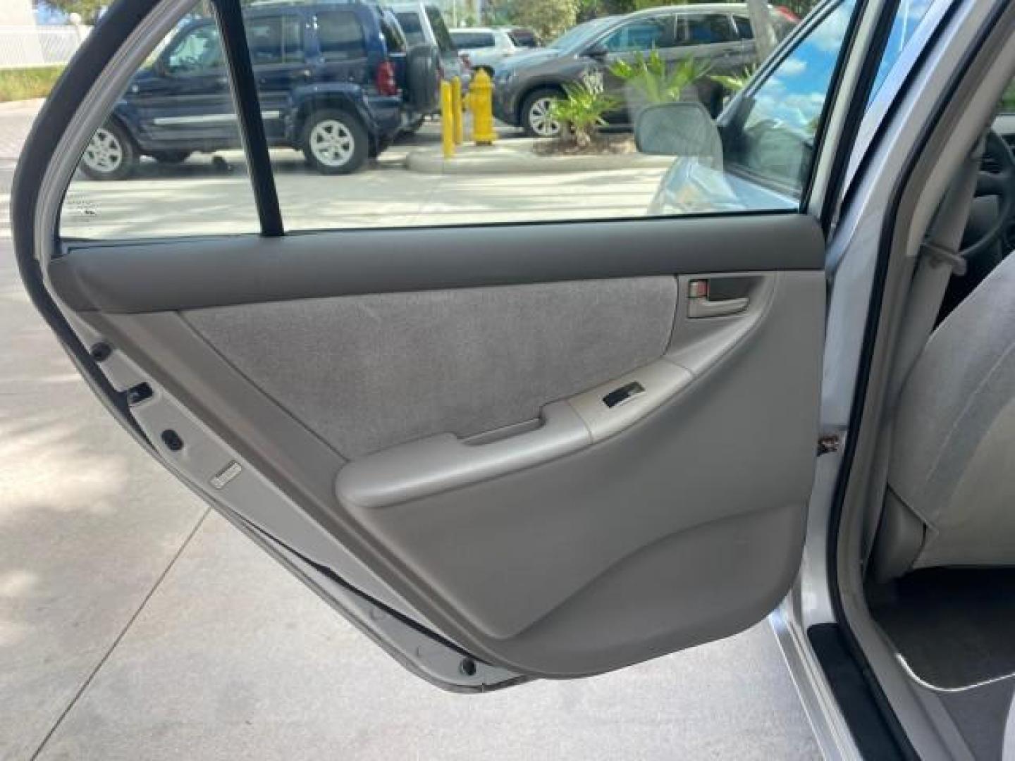 2007 Silver Streak Mica /Stone Toyota Corolla LOADED LOW MILES 11,867 1 OWNER (1NXBR32E07Z) with an 1.8L DOHC SFI 16-Valve VVT-i 4-Cyl Engine engine, Automatic transmission, located at 4701 North Dixie Hwy, Pompano Beach, FL, 33064, (954) 422-2889, 26.240938, -80.123474 - OUR WEBPAGE FLORIDACARS1.COM HAS OVER 100 PHOTOS AND FREE CARFAX LINK 2007 TOYOTA COROLLA CE HAS EVERY OPTION AS A LE - FULLY LOADED VIN: 1NXBR32E07Z816925 1 N X B R 3 2 E 0 7 Z 8 1 6 9 2 5 SEDAN 4 DR 1.8L I4 F DOHC 16V GASOLINE 41 MPG FRONT WHEEL DRIVE Features Air Conditioning AM/FM Stereo Automat - Photo#69