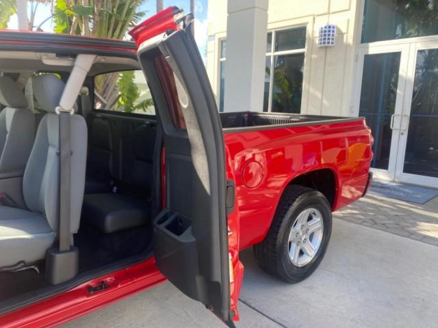 2011 Flame Red /Dark Khaki/Medium Khaki Interior Ram Dakota Bighorn/Lonestar LOW MILES 65,882 1 OWNER (1D7RE3BK7BS) with an 3.7L V6 Engine engine, Automatic transmission, located at 4701 North Dixie Hwy, Pompano Beach, FL, 33064, (954) 422-2889, 26.240938, -80.123474 - OUR WEBPAGE FLORIDACARS1.COM HAS OVER 100 PHOTOS AND FREE CARFAX LINK 2011 RAM DAKOTA BIG HORN 1 OWNER VIN: 1D7RE3BK7BS708235 1 D 7 R E 3 B K 7 B S 7 0 8 2 3 5 4 DOOR EXTENDED CAB PICKUP 3.7L V6 F SOHC 12V GASOLINE 20 MPG REAR WHEEL DRIVE Features ABS Brakes Air Conditioning Alloy Wheels AM/FM Stere - Photo#66