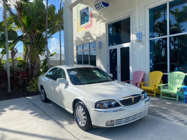 2004 Ceramic White Tri-Coat /Dark Stone/Med Lt Stone Lincoln LS LOW MILES 43,468 1 OWNER (1LNHM86S54Y) with an 3.0L DOHC SMPI 24-Valve V6 Engine engine, Automatic transmission, located at 4701 North Dixie Hwy, Pompano Beach, FL, 33064, (954) 422-2889, 26.240938, -80.123474 - OUR WEBPAGE FLORIDACARS1.COM HAS OVER 100 PHOTOS AND FREE CARFAX LINK 2004 LINCOLN LS LUXURY 1 OWNER VIN: 1LNHM86S54Y643526 1 L N H M 8 6 S 5 4 Y 6 4 3 5 2 6 SEDAN 4 DR 3.0L V6 F DOHC GASOLINE 26 MPG REAR WHEEL DRIVE Features ABS Brakes Air Conditioning Alloy Wheels AM/FM Stereo Automatic Transmissi - Photo#1