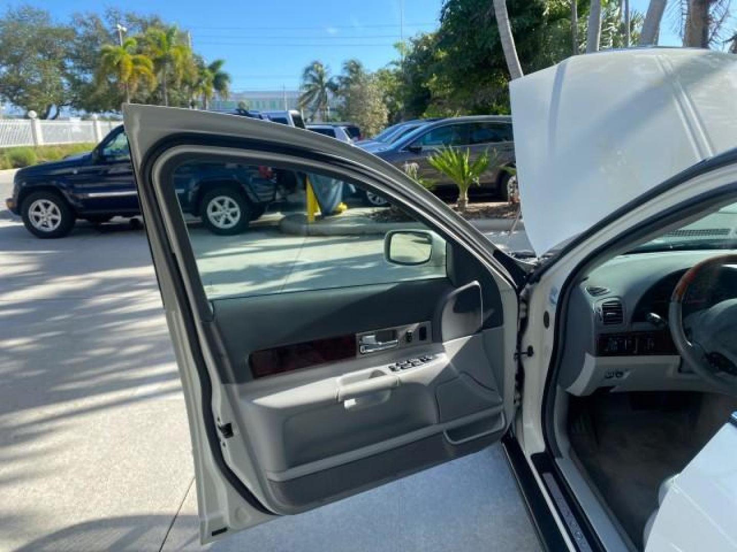 2004 Ceramic White Tri-Coat /Dark Stone/Med Lt Stone Lincoln LS LOW MILES 43,468 1 OWNER (1LNHM86S54Y) with an 3.0L DOHC SMPI 24-Valve V6 Engine engine, Automatic transmission, located at 4701 North Dixie Hwy, Pompano Beach, FL, 33064, (954) 422-2889, 26.240938, -80.123474 - OUR WEBPAGE FLORIDACARS1.COM HAS OVER 100 PHOTOS AND FREE CARFAX LINK 2004 LINCOLN LS LUXURY 1 OWNER VIN: 1LNHM86S54Y643526 1 L N H M 8 6 S 5 4 Y 6 4 3 5 2 6 SEDAN 4 DR 3.0L V6 F DOHC GASOLINE 26 MPG REAR WHEEL DRIVE Features ABS Brakes Air Conditioning Alloy Wheels AM/FM Stereo Automatic Transmissi - Photo#9