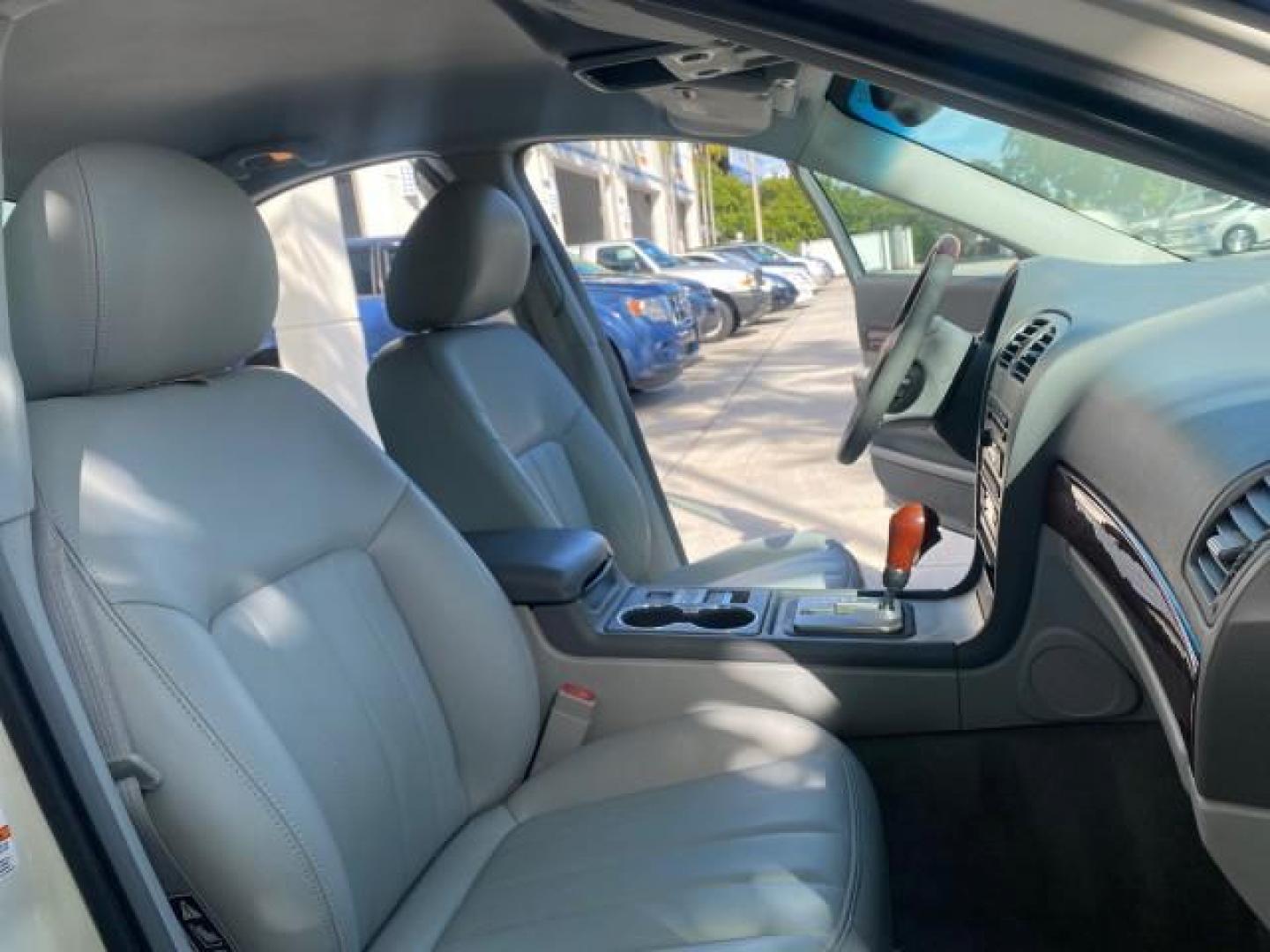 2004 Ceramic White Tri-Coat /Dark Stone/Med Lt Stone Lincoln LS LOW MILES 43,468 1 OWNER (1LNHM86S54Y) with an 3.0L DOHC SMPI 24-Valve V6 Engine engine, Automatic transmission, located at 4701 North Dixie Hwy, Pompano Beach, FL, 33064, (954) 422-2889, 26.240938, -80.123474 - OUR WEBPAGE FLORIDACARS1.COM HAS OVER 100 PHOTOS AND FREE CARFAX LINK 2004 LINCOLN LS LUXURY 1 OWNER VIN: 1LNHM86S54Y643526 1 L N H M 8 6 S 5 4 Y 6 4 3 5 2 6 SEDAN 4 DR 3.0L V6 F DOHC GASOLINE 26 MPG REAR WHEEL DRIVE Features ABS Brakes Air Conditioning Alloy Wheels AM/FM Stereo Automatic Transmissi - Photo#12