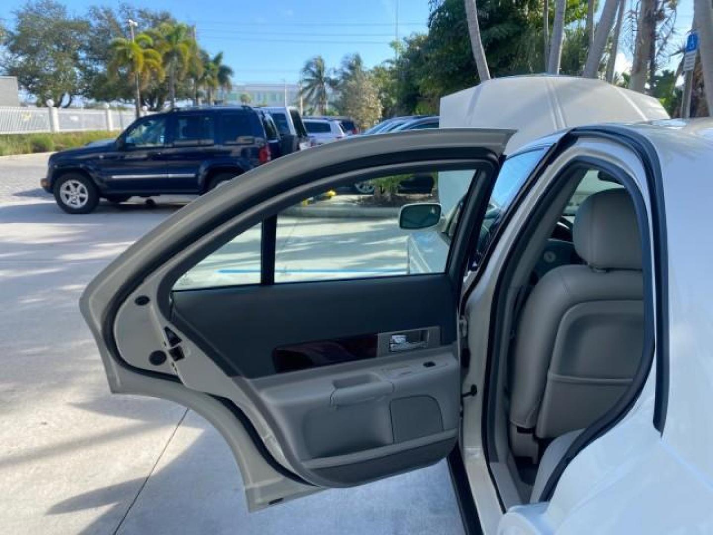 2004 Ceramic White Tri-Coat /Dark Stone/Med Lt Stone Lincoln LS LOW MILES 43,468 1 OWNER (1LNHM86S54Y) with an 3.0L DOHC SMPI 24-Valve V6 Engine engine, Automatic transmission, located at 4701 North Dixie Hwy, Pompano Beach, FL, 33064, (954) 422-2889, 26.240938, -80.123474 - OUR WEBPAGE FLORIDACARS1.COM HAS OVER 100 PHOTOS AND FREE CARFAX LINK 2004 LINCOLN LS LUXURY 1 OWNER VIN: 1LNHM86S54Y643526 1 L N H M 8 6 S 5 4 Y 6 4 3 5 2 6 SEDAN 4 DR 3.0L V6 F DOHC GASOLINE 26 MPG REAR WHEEL DRIVE Features ABS Brakes Air Conditioning Alloy Wheels AM/FM Stereo Automatic Transmissi - Photo#13