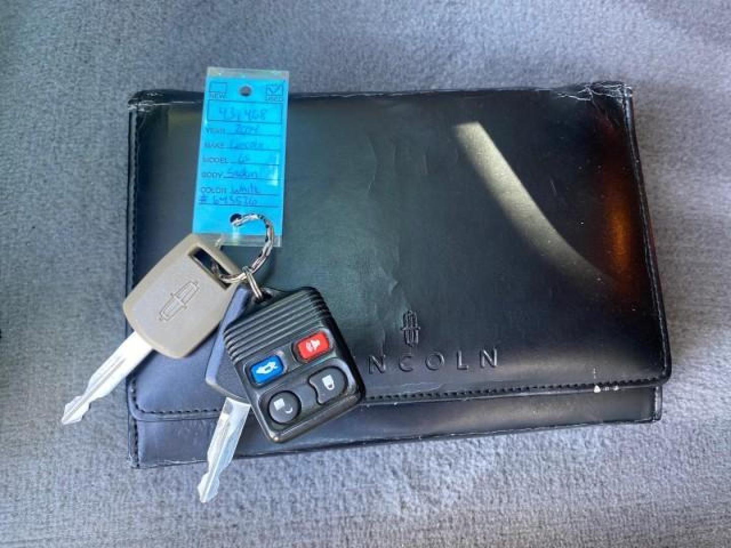 2004 Ceramic White Tri-Coat /Dark Stone/Med Lt Stone Lincoln LS LOW MILES 43,468 1 OWNER (1LNHM86S54Y) with an 3.0L DOHC SMPI 24-Valve V6 Engine engine, Automatic transmission, located at 4701 North Dixie Hwy, Pompano Beach, FL, 33064, (954) 422-2889, 26.240938, -80.123474 - OUR WEBPAGE FLORIDACARS1.COM HAS OVER 100 PHOTOS AND FREE CARFAX LINK 2004 LINCOLN LS LUXURY 1 OWNER VIN: 1LNHM86S54Y643526 1 L N H M 8 6 S 5 4 Y 6 4 3 5 2 6 SEDAN 4 DR 3.0L V6 F DOHC GASOLINE 26 MPG REAR WHEEL DRIVE Features ABS Brakes Air Conditioning Alloy Wheels AM/FM Stereo Automatic Transmissi - Photo#23