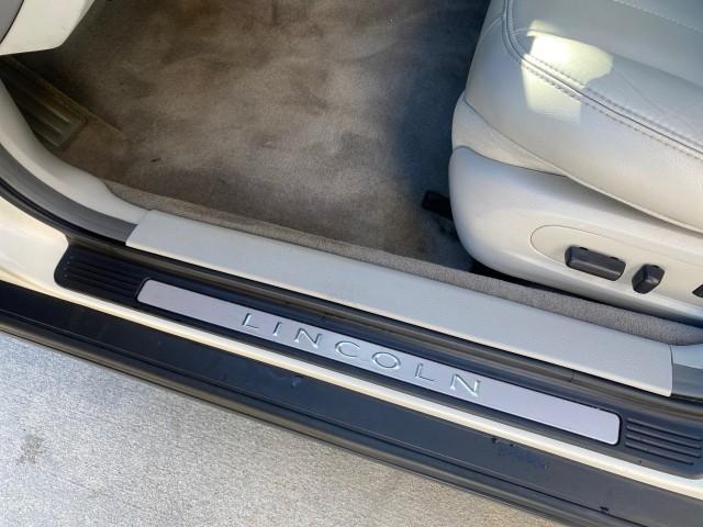 2004 Ceramic White Tri-Coat /Dark Stone/Med Lt Stone Lincoln LS LOW MILES 43,468 1 OWNER (1LNHM86S54Y) with an 3.0L DOHC SMPI 24-Valve V6 Engine engine, Automatic transmission, located at 4701 North Dixie Hwy, Pompano Beach, FL, 33064, (954) 422-2889, 26.240938, -80.123474 - OUR WEBPAGE FLORIDACARS1.COM HAS OVER 100 PHOTOS AND FREE CARFAX LINK 2004 LINCOLN LS LUXURY 1 OWNER VIN: 1LNHM86S54Y643526 1 L N H M 8 6 S 5 4 Y 6 4 3 5 2 6 SEDAN 4 DR 3.0L V6 F DOHC GASOLINE 26 MPG REAR WHEEL DRIVE Features ABS Brakes Air Conditioning Alloy Wheels AM/FM Stereo Automatic Transmissi - Photo#43