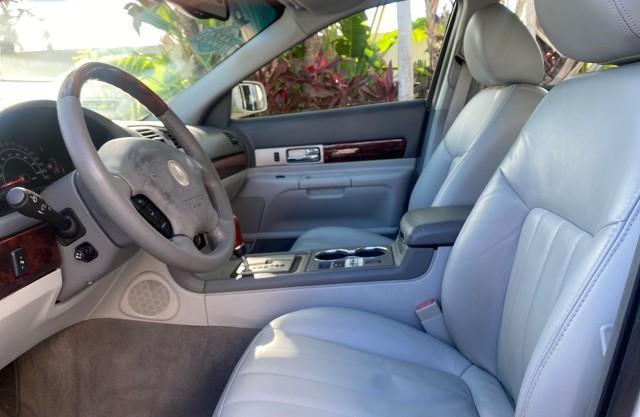 2004 Ceramic White Tri-Coat /Dark Stone/Med Lt Stone Lincoln LS LOW MILES 43,468 1 OWNER (1LNHM86S54Y) with an 3.0L DOHC SMPI 24-Valve V6 Engine engine, Automatic transmission, located at 4701 North Dixie Hwy, Pompano Beach, FL, 33064, (954) 422-2889, 26.240938, -80.123474 - OUR WEBPAGE FLORIDACARS1.COM HAS OVER 100 PHOTOS AND FREE CARFAX LINK 2004 LINCOLN LS LUXURY 1 OWNER VIN: 1LNHM86S54Y643526 1 L N H M 8 6 S 5 4 Y 6 4 3 5 2 6 SEDAN 4 DR 3.0L V6 F DOHC GASOLINE 26 MPG REAR WHEEL DRIVE Features ABS Brakes Air Conditioning Alloy Wheels AM/FM Stereo Automatic Transmissi - Photo#47