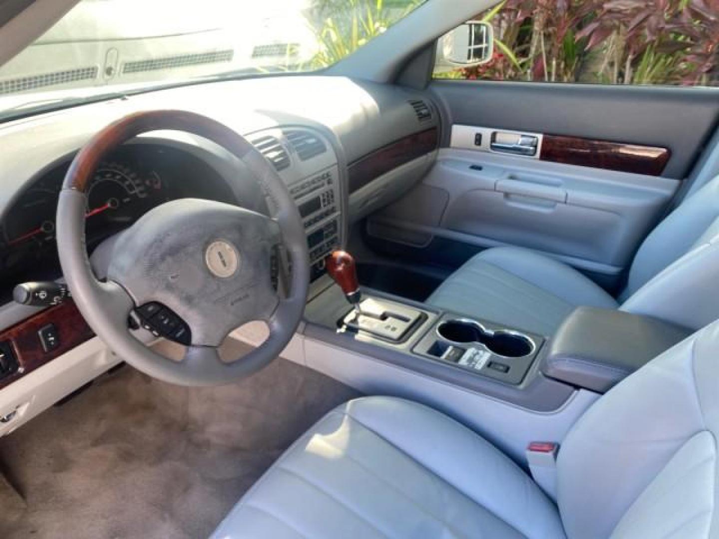 2004 Ceramic White Tri-Coat /Dark Stone/Med Lt Stone Lincoln LS LOW MILES 43,468 1 OWNER (1LNHM86S54Y) with an 3.0L DOHC SMPI 24-Valve V6 Engine engine, Automatic transmission, located at 4701 North Dixie Hwy, Pompano Beach, FL, 33064, (954) 422-2889, 26.240938, -80.123474 - OUR WEBPAGE FLORIDACARS1.COM HAS OVER 100 PHOTOS AND FREE CARFAX LINK 2004 LINCOLN LS LUXURY 1 OWNER VIN: 1LNHM86S54Y643526 1 L N H M 8 6 S 5 4 Y 6 4 3 5 2 6 SEDAN 4 DR 3.0L V6 F DOHC GASOLINE 26 MPG REAR WHEEL DRIVE Features ABS Brakes Air Conditioning Alloy Wheels AM/FM Stereo Automatic Transmissi - Photo#48