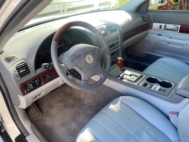 2004 Ceramic White Tri-Coat /Dark Stone/Med Lt Stone Lincoln LS LOW MILES 43,468 1 OWNER (1LNHM86S54Y) with an 3.0L DOHC SMPI 24-Valve V6 Engine engine, Automatic transmission, located at 4701 North Dixie Hwy, Pompano Beach, FL, 33064, (954) 422-2889, 26.240938, -80.123474 - OUR WEBPAGE FLORIDACARS1.COM HAS OVER 100 PHOTOS AND FREE CARFAX LINK 2004 LINCOLN LS LUXURY 1 OWNER VIN: 1LNHM86S54Y643526 1 L N H M 8 6 S 5 4 Y 6 4 3 5 2 6 SEDAN 4 DR 3.0L V6 F DOHC GASOLINE 26 MPG REAR WHEEL DRIVE Features ABS Brakes Air Conditioning Alloy Wheels AM/FM Stereo Automatic Transmissi - Photo#49