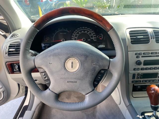 2004 Ceramic White Tri-Coat /Dark Stone/Med Lt Stone Lincoln LS LOW MILES 43,468 1 OWNER (1LNHM86S54Y) with an 3.0L DOHC SMPI 24-Valve V6 Engine engine, Automatic transmission, located at 4701 North Dixie Hwy, Pompano Beach, FL, 33064, (954) 422-2889, 26.240938, -80.123474 - OUR WEBPAGE FLORIDACARS1.COM HAS OVER 100 PHOTOS AND FREE CARFAX LINK 2004 LINCOLN LS LUXURY 1 OWNER VIN: 1LNHM86S54Y643526 1 L N H M 8 6 S 5 4 Y 6 4 3 5 2 6 SEDAN 4 DR 3.0L V6 F DOHC GASOLINE 26 MPG REAR WHEEL DRIVE Features ABS Brakes Air Conditioning Alloy Wheels AM/FM Stereo Automatic Transmissi - Photo#50