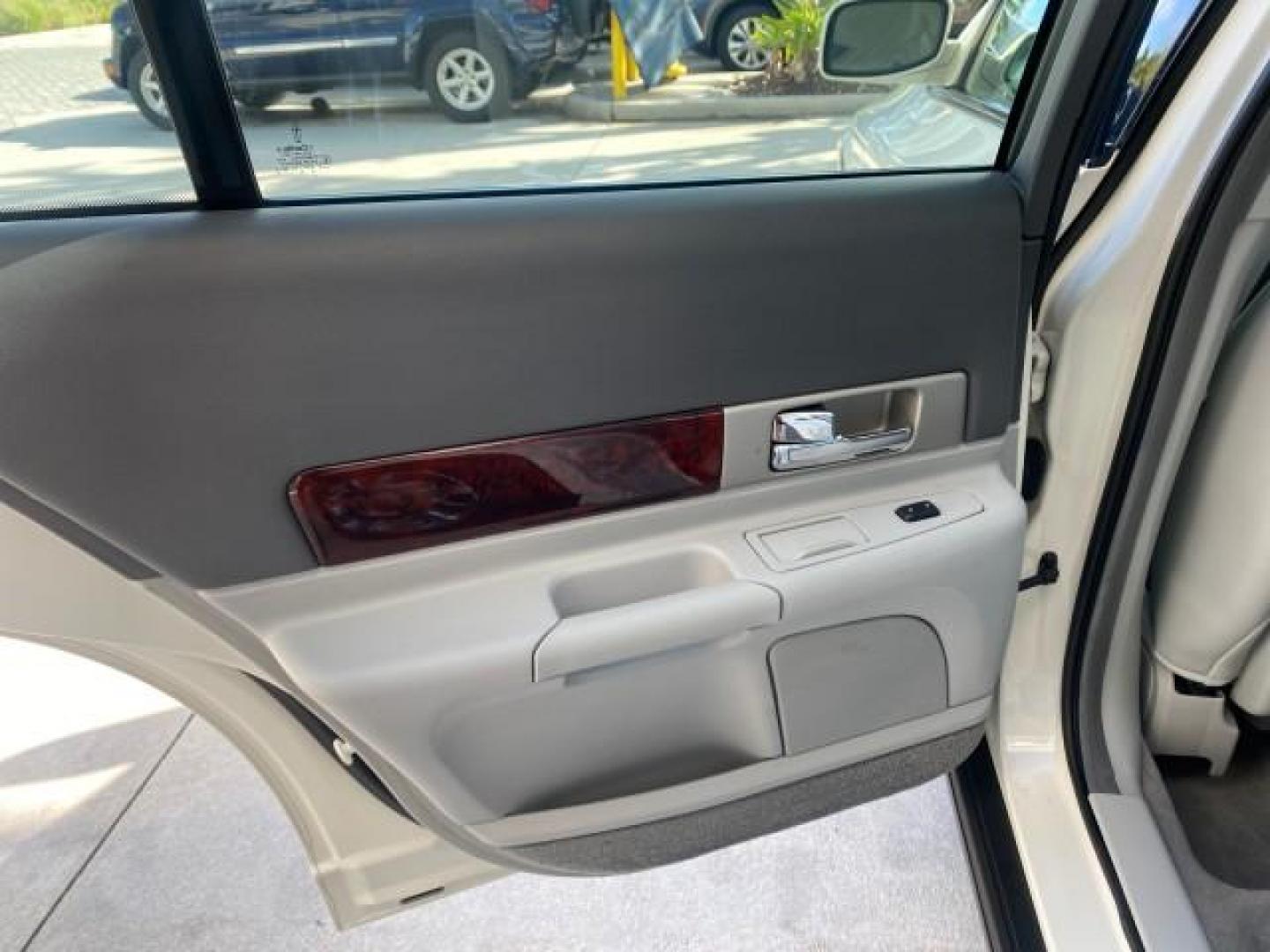 2004 Ceramic White Tri-Coat /Dark Stone/Med Lt Stone Lincoln LS LOW MILES 43,468 1 OWNER (1LNHM86S54Y) with an 3.0L DOHC SMPI 24-Valve V6 Engine engine, Automatic transmission, located at 4701 North Dixie Hwy, Pompano Beach, FL, 33064, (954) 422-2889, 26.240938, -80.123474 - OUR WEBPAGE FLORIDACARS1.COM HAS OVER 100 PHOTOS AND FREE CARFAX LINK 2004 LINCOLN LS LUXURY 1 OWNER VIN: 1LNHM86S54Y643526 1 L N H M 8 6 S 5 4 Y 6 4 3 5 2 6 SEDAN 4 DR 3.0L V6 F DOHC GASOLINE 26 MPG REAR WHEEL DRIVE Features ABS Brakes Air Conditioning Alloy Wheels AM/FM Stereo Automatic Transmissi - Photo#75