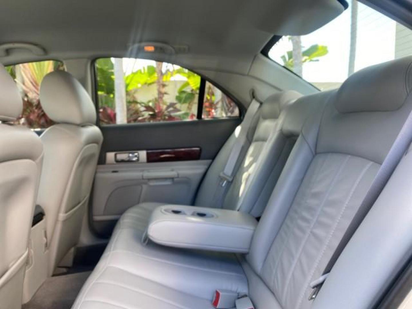 2004 Ceramic White Tri-Coat /Dark Stone/Med Lt Stone Lincoln LS LOW MILES 43,468 1 OWNER (1LNHM86S54Y) with an 3.0L DOHC SMPI 24-Valve V6 Engine engine, Automatic transmission, located at 4701 North Dixie Hwy, Pompano Beach, FL, 33064, (954) 422-2889, 26.240938, -80.123474 - OUR WEBPAGE FLORIDACARS1.COM HAS OVER 100 PHOTOS AND FREE CARFAX LINK 2004 LINCOLN LS LUXURY 1 OWNER VIN: 1LNHM86S54Y643526 1 L N H M 8 6 S 5 4 Y 6 4 3 5 2 6 SEDAN 4 DR 3.0L V6 F DOHC GASOLINE 26 MPG REAR WHEEL DRIVE Features ABS Brakes Air Conditioning Alloy Wheels AM/FM Stereo Automatic Transmissi - Photo#77