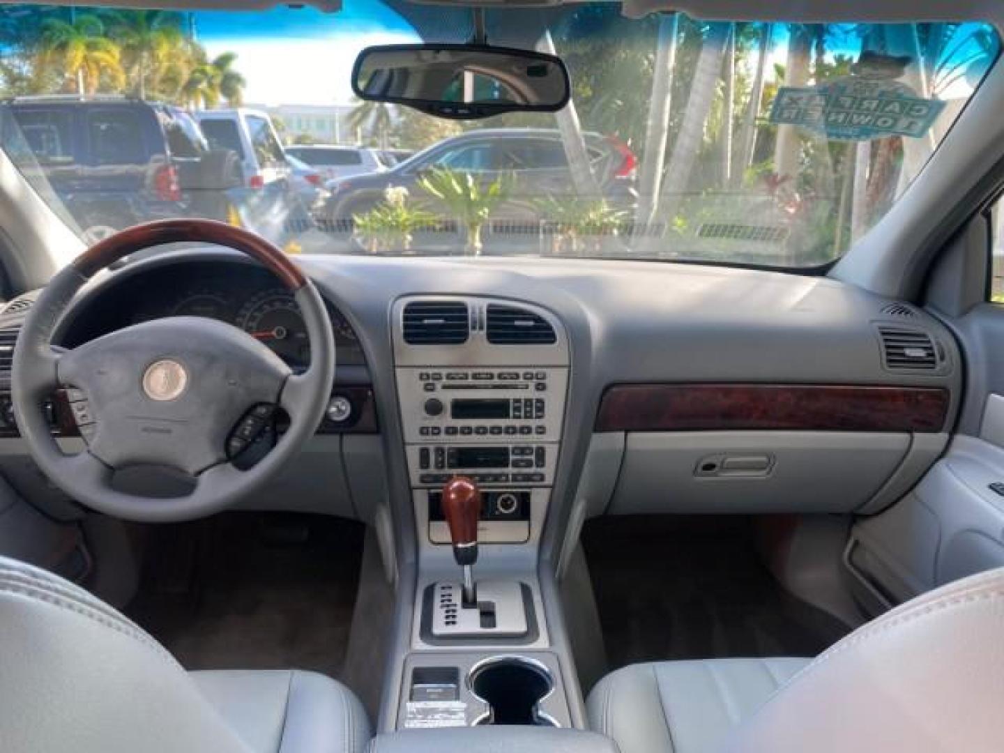 2004 Ceramic White Tri-Coat /Dark Stone/Med Lt Stone Lincoln LS LOW MILES 43,468 1 OWNER (1LNHM86S54Y) with an 3.0L DOHC SMPI 24-Valve V6 Engine engine, Automatic transmission, located at 4701 North Dixie Hwy, Pompano Beach, FL, 33064, (954) 422-2889, 26.240938, -80.123474 - OUR WEBPAGE FLORIDACARS1.COM HAS OVER 100 PHOTOS AND FREE CARFAX LINK 2004 LINCOLN LS LUXURY 1 OWNER VIN: 1LNHM86S54Y643526 1 L N H M 8 6 S 5 4 Y 6 4 3 5 2 6 SEDAN 4 DR 3.0L V6 F DOHC GASOLINE 26 MPG REAR WHEEL DRIVE Features ABS Brakes Air Conditioning Alloy Wheels AM/FM Stereo Automatic Transmissi - Photo#83