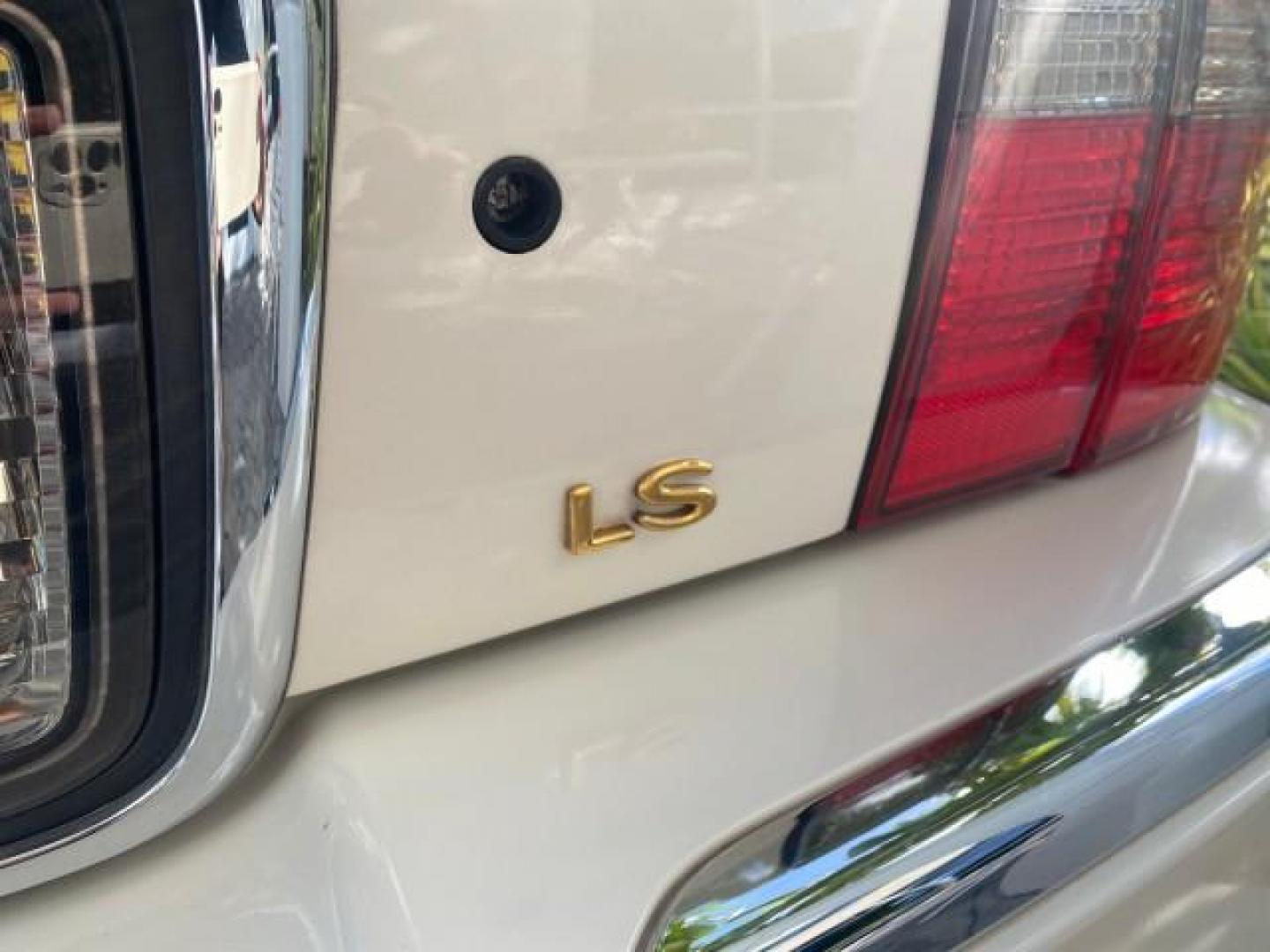 2004 Ceramic White Tri-Coat /Dark Stone/Med Lt Stone Lincoln LS LOW MILES 43,468 1 OWNER (1LNHM86S54Y) with an 3.0L DOHC SMPI 24-Valve V6 Engine engine, Automatic transmission, located at 4701 North Dixie Hwy, Pompano Beach, FL, 33064, (954) 422-2889, 26.240938, -80.123474 - OUR WEBPAGE FLORIDACARS1.COM HAS OVER 100 PHOTOS AND FREE CARFAX LINK 2004 LINCOLN LS LUXURY 1 OWNER VIN: 1LNHM86S54Y643526 1 L N H M 8 6 S 5 4 Y 6 4 3 5 2 6 SEDAN 4 DR 3.0L V6 F DOHC GASOLINE 26 MPG REAR WHEEL DRIVE Features ABS Brakes Air Conditioning Alloy Wheels AM/FM Stereo Automatic Transmissi - Photo#91