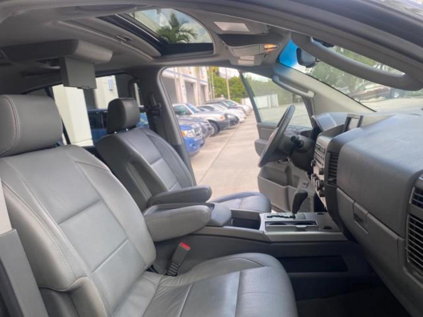 2006 Granite Metallic /Steel/Titanium Nissan Armada SUV 4x4 SE LOW MILES 46,059 1 OWNER (5N1AA08B36N) with an 5.6L DOHC 32-Valve Endurance V8 Engine engine, Automatic transmission, located at 4701 North Dixie Hwy, Pompano Beach, FL, 33064, (954) 422-2889, 26.240938, -80.123474 - OUR WEBPAGE FLORIDACARS1.COM HAS OVER 100 PHOTOS AND FREE CARFAX LINK 2006 NISSAN ARMADA LE LEATHER SUNROOF LOADED TOP OF THE LINE VIN: 5N1AA08B36N727681 5 N 1 A A 0 8 B 3 6 N 7 2 7 6 8 1 4 DOOR WAGON/SPORT UTILITY 5.6L V8 F DOHC 32V GASOLINE 18 MPG REAR WHEEL DRIVE W/ 4X4 Features 4WD/AWD ABS Brake - Photo#12