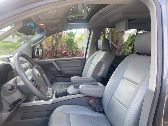 2006 Granite Metallic /Steel/Titanium Nissan Armada 4x4 SE LOW MILES 46,059 1 OWNER (5N1AA08B36N) with an 5.6L DOHC 32-Valve Endurance V8 Engine engine, Automatic transmission, located at 4701 North Dixie Hwy, Pompano Beach, FL, 33064, (954) 422-2889, 26.240938, -80.123474 - OUR WEBPAGE FLORIDACARS1.COM HAS OVER 100 PHOTOS AND FREE CARFAX LINK 2006 NISSAN ARMADA LE LEATHER SUNROOF LOADED TOP OF THE LINE VIN: 5N1AA08B36N727681 5 N 1 A A 0 8 B 3 6 N 7 2 7 6 8 1 4 DOOR WAGON/SPORT UTILITY 5.6L V8 F DOHC 32V GASOLINE 18 MPG REAR WHEEL DRIVE W/ 4X4 Features 4WD/AWD ABS Brake - Photo#44