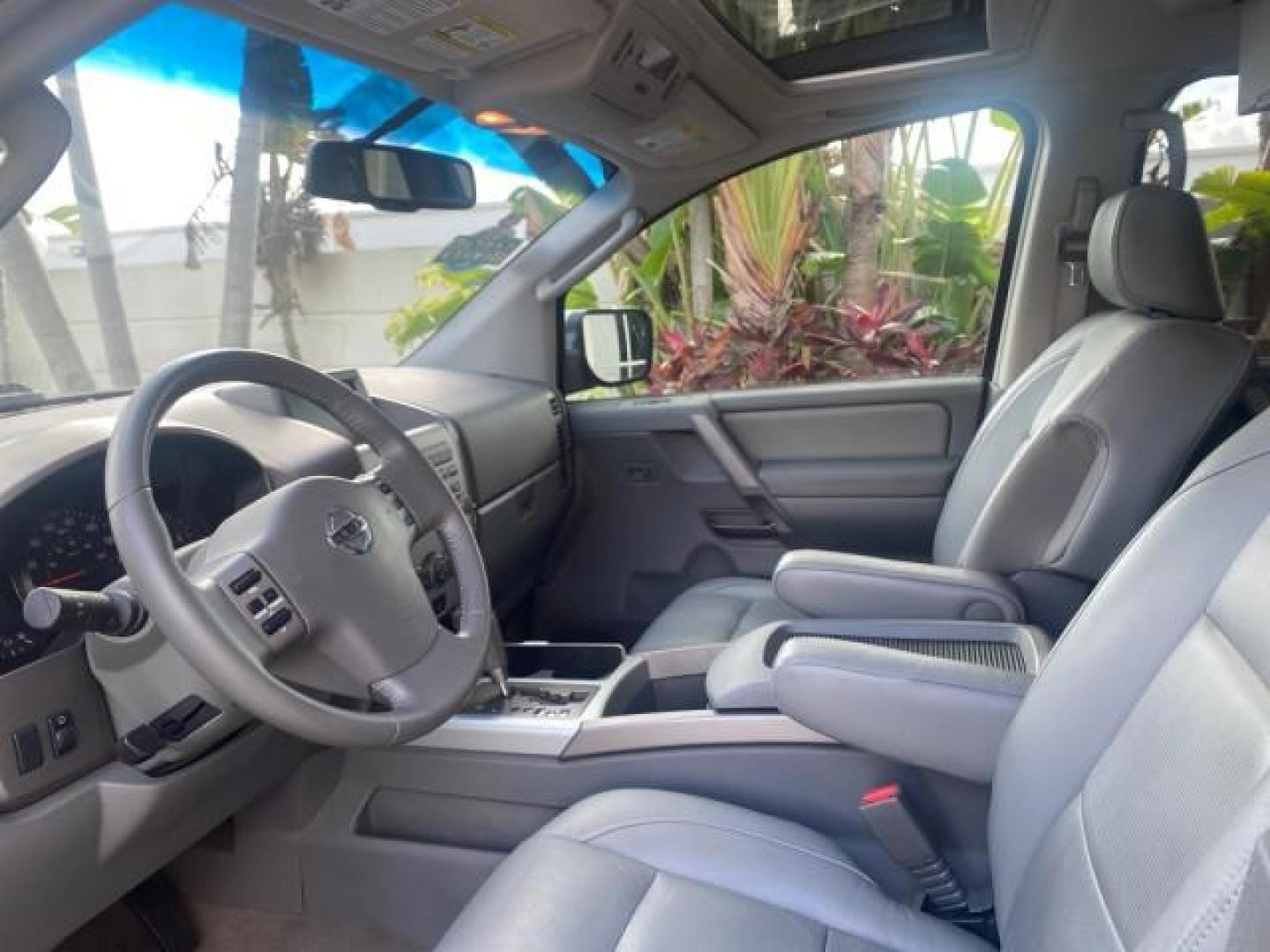 2006 Granite Metallic /Steel/Titanium Nissan Armada SUV 4x4 SE LOW MILES 46,059 1 OWNER (5N1AA08B36N) with an 5.6L DOHC 32-Valve Endurance V8 Engine engine, Automatic transmission, located at 4701 North Dixie Hwy, Pompano Beach, FL, 33064, (954) 422-2889, 26.240938, -80.123474 - OUR WEBPAGE FLORIDACARS1.COM HAS OVER 100 PHOTOS AND FREE CARFAX LINK 2006 NISSAN ARMADA LE LEATHER SUNROOF LOADED TOP OF THE LINE VIN: 5N1AA08B36N727681 5 N 1 A A 0 8 B 3 6 N 7 2 7 6 8 1 4 DOOR WAGON/SPORT UTILITY 5.6L V8 F DOHC 32V GASOLINE 18 MPG REAR WHEEL DRIVE W/ 4X4 Features 4WD/AWD ABS Brake - Photo#46