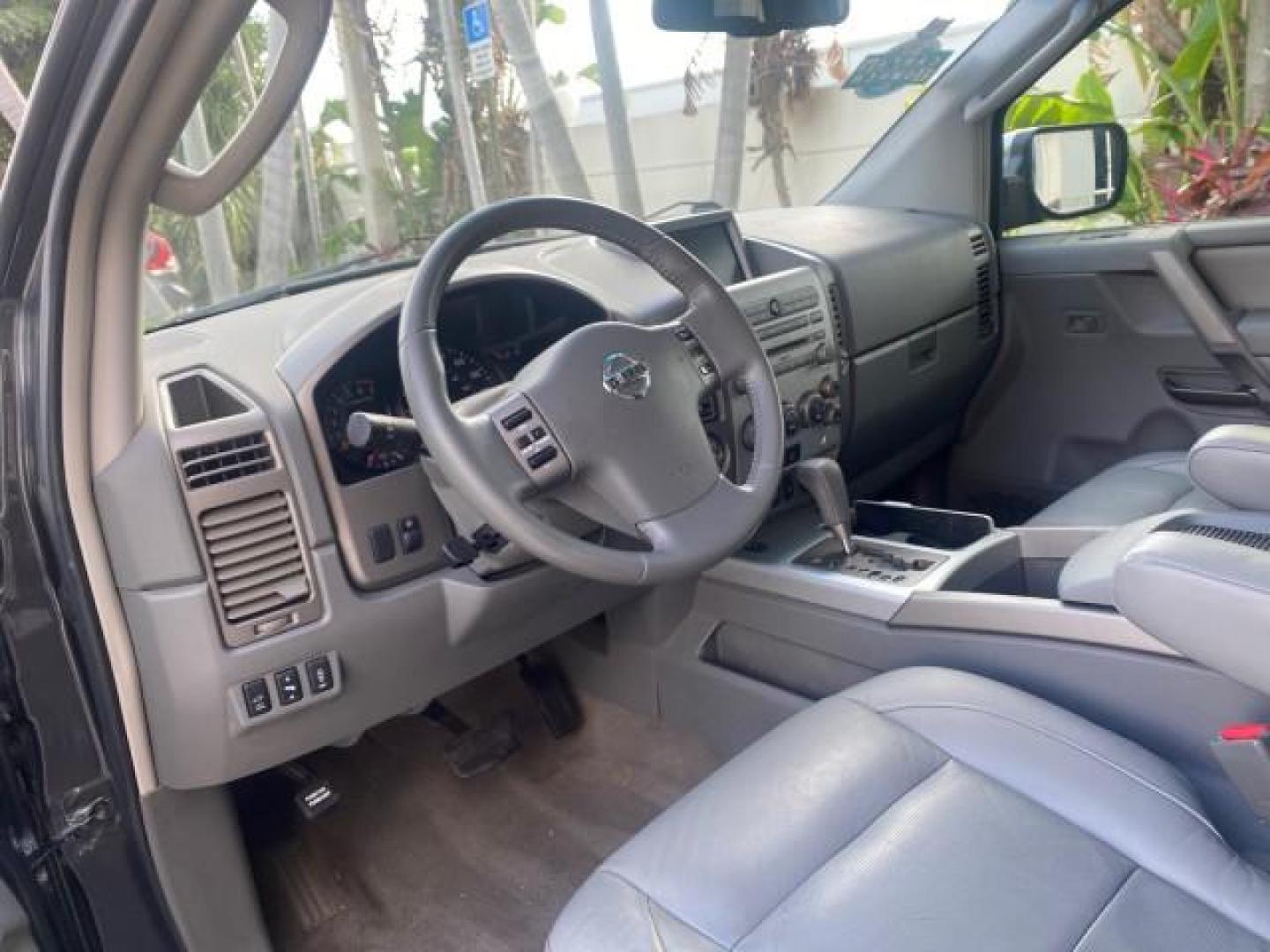 2006 Granite Metallic /Steel/Titanium Nissan Armada SUV 4x4 SE LOW MILES 46,059 1 OWNER (5N1AA08B36N) with an 5.6L DOHC 32-Valve Endurance V8 Engine engine, Automatic transmission, located at 4701 North Dixie Hwy, Pompano Beach, FL, 33064, (954) 422-2889, 26.240938, -80.123474 - OUR WEBPAGE FLORIDACARS1.COM HAS OVER 100 PHOTOS AND FREE CARFAX LINK 2006 NISSAN ARMADA LE LEATHER SUNROOF LOADED TOP OF THE LINE VIN: 5N1AA08B36N727681 5 N 1 A A 0 8 B 3 6 N 7 2 7 6 8 1 4 DOOR WAGON/SPORT UTILITY 5.6L V8 F DOHC 32V GASOLINE 18 MPG REAR WHEEL DRIVE W/ 4X4 Features 4WD/AWD ABS Brake - Photo#49