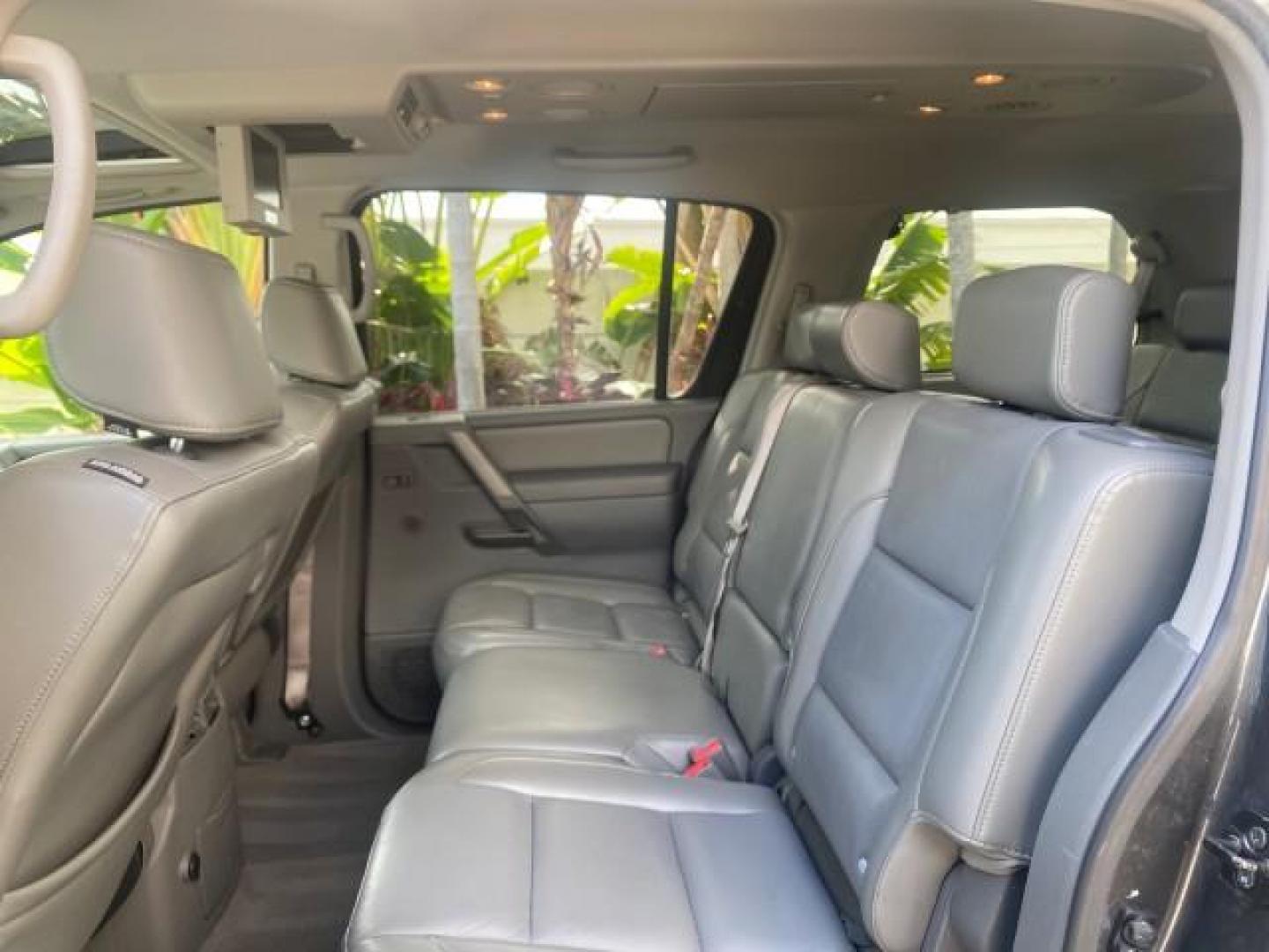 2006 Granite Metallic /Steel/Titanium Nissan Armada SUV 4x4 SE LOW MILES 46,059 1 OWNER (5N1AA08B36N) with an 5.6L DOHC 32-Valve Endurance V8 Engine engine, Automatic transmission, located at 4701 North Dixie Hwy, Pompano Beach, FL, 33064, (954) 422-2889, 26.240938, -80.123474 - OUR WEBPAGE FLORIDACARS1.COM HAS OVER 100 PHOTOS AND FREE CARFAX LINK 2006 NISSAN ARMADA LE LEATHER SUNROOF LOADED TOP OF THE LINE VIN: 5N1AA08B36N727681 5 N 1 A A 0 8 B 3 6 N 7 2 7 6 8 1 4 DOOR WAGON/SPORT UTILITY 5.6L V8 F DOHC 32V GASOLINE 18 MPG REAR WHEEL DRIVE W/ 4X4 Features 4WD/AWD ABS Brake - Photo#85