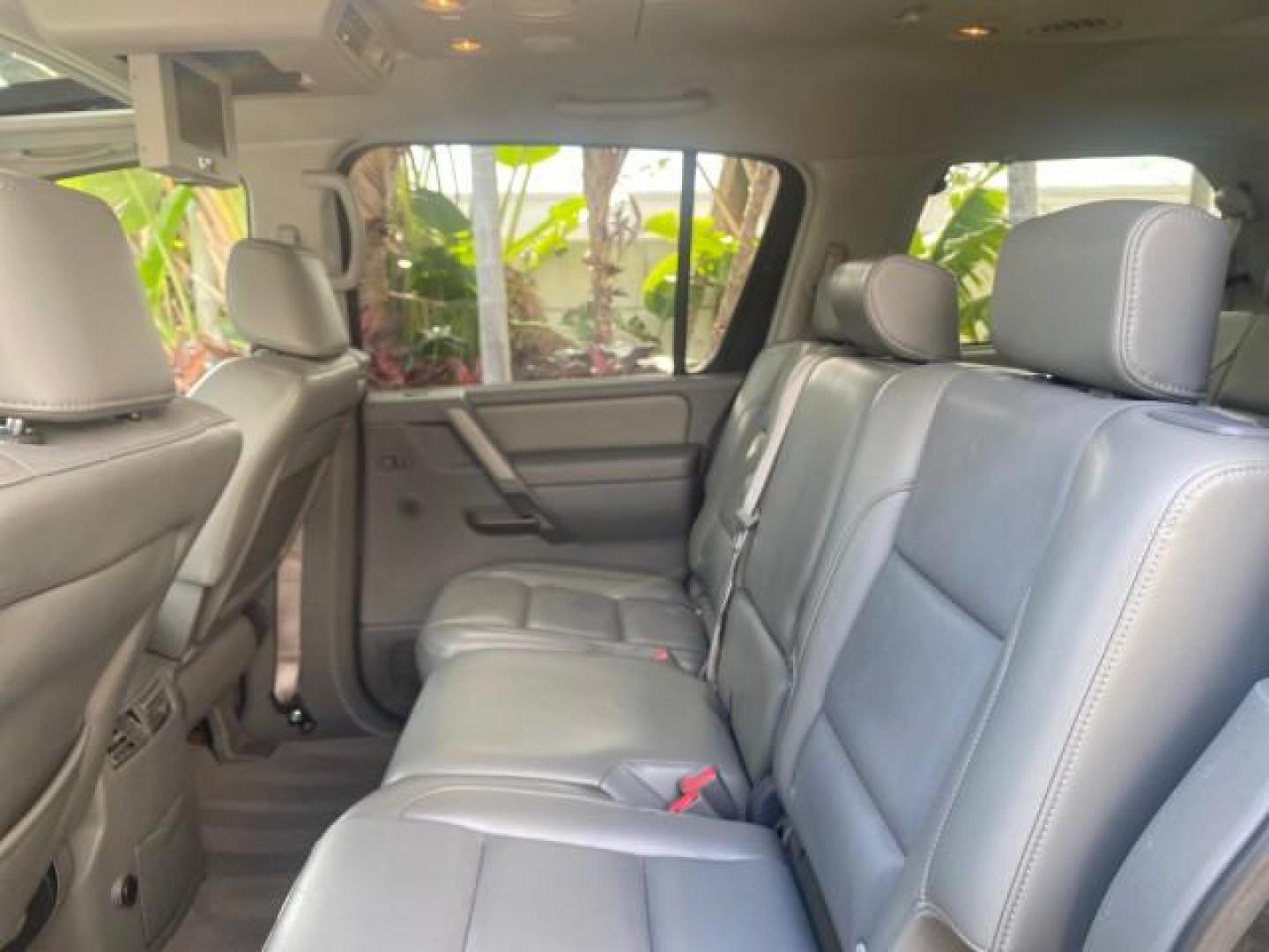 2006 Granite Metallic /Steel/Titanium Nissan Armada SUV 4x4 SE LOW MILES 46,059 1 OWNER (5N1AA08B36N) with an 5.6L DOHC 32-Valve Endurance V8 Engine engine, Automatic transmission, located at 4701 North Dixie Hwy, Pompano Beach, FL, 33064, (954) 422-2889, 26.240938, -80.123474 - OUR WEBPAGE FLORIDACARS1.COM HAS OVER 100 PHOTOS AND FREE CARFAX LINK 2006 NISSAN ARMADA LE LEATHER SUNROOF LOADED TOP OF THE LINE VIN: 5N1AA08B36N727681 5 N 1 A A 0 8 B 3 6 N 7 2 7 6 8 1 4 DOOR WAGON/SPORT UTILITY 5.6L V8 F DOHC 32V GASOLINE 18 MPG REAR WHEEL DRIVE W/ 4X4 Features 4WD/AWD ABS Brake - Photo#86