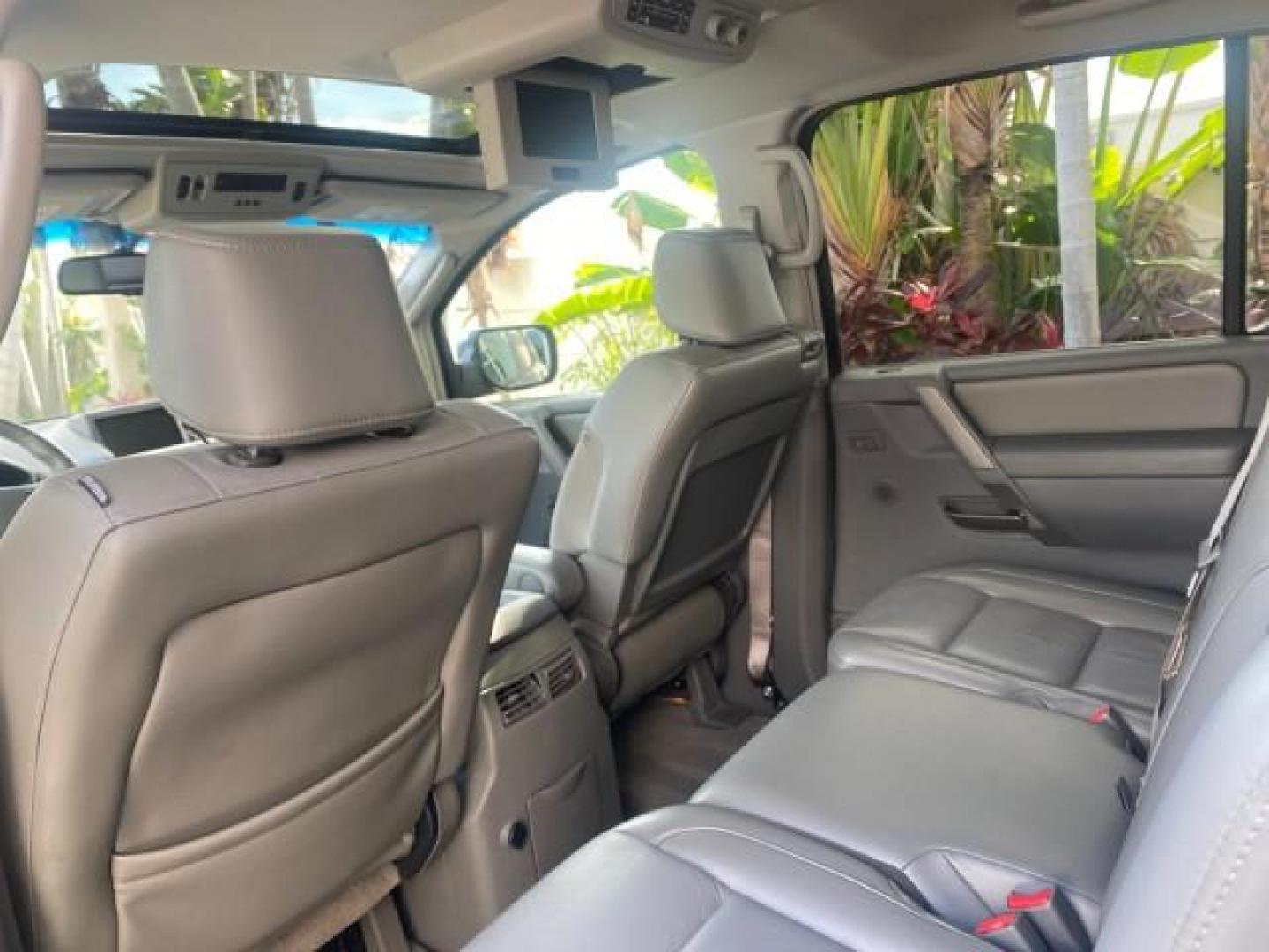 2006 Granite Metallic /Steel/Titanium Nissan Armada SUV 4x4 SE LOW MILES 46,059 1 OWNER (5N1AA08B36N) with an 5.6L DOHC 32-Valve Endurance V8 Engine engine, Automatic transmission, located at 4701 North Dixie Hwy, Pompano Beach, FL, 33064, (954) 422-2889, 26.240938, -80.123474 - OUR WEBPAGE FLORIDACARS1.COM HAS OVER 100 PHOTOS AND FREE CARFAX LINK 2006 NISSAN ARMADA LE LEATHER SUNROOF LOADED TOP OF THE LINE VIN: 5N1AA08B36N727681 5 N 1 A A 0 8 B 3 6 N 7 2 7 6 8 1 4 DOOR WAGON/SPORT UTILITY 5.6L V8 F DOHC 32V GASOLINE 18 MPG REAR WHEEL DRIVE W/ 4X4 Features 4WD/AWD ABS Brake - Photo#88