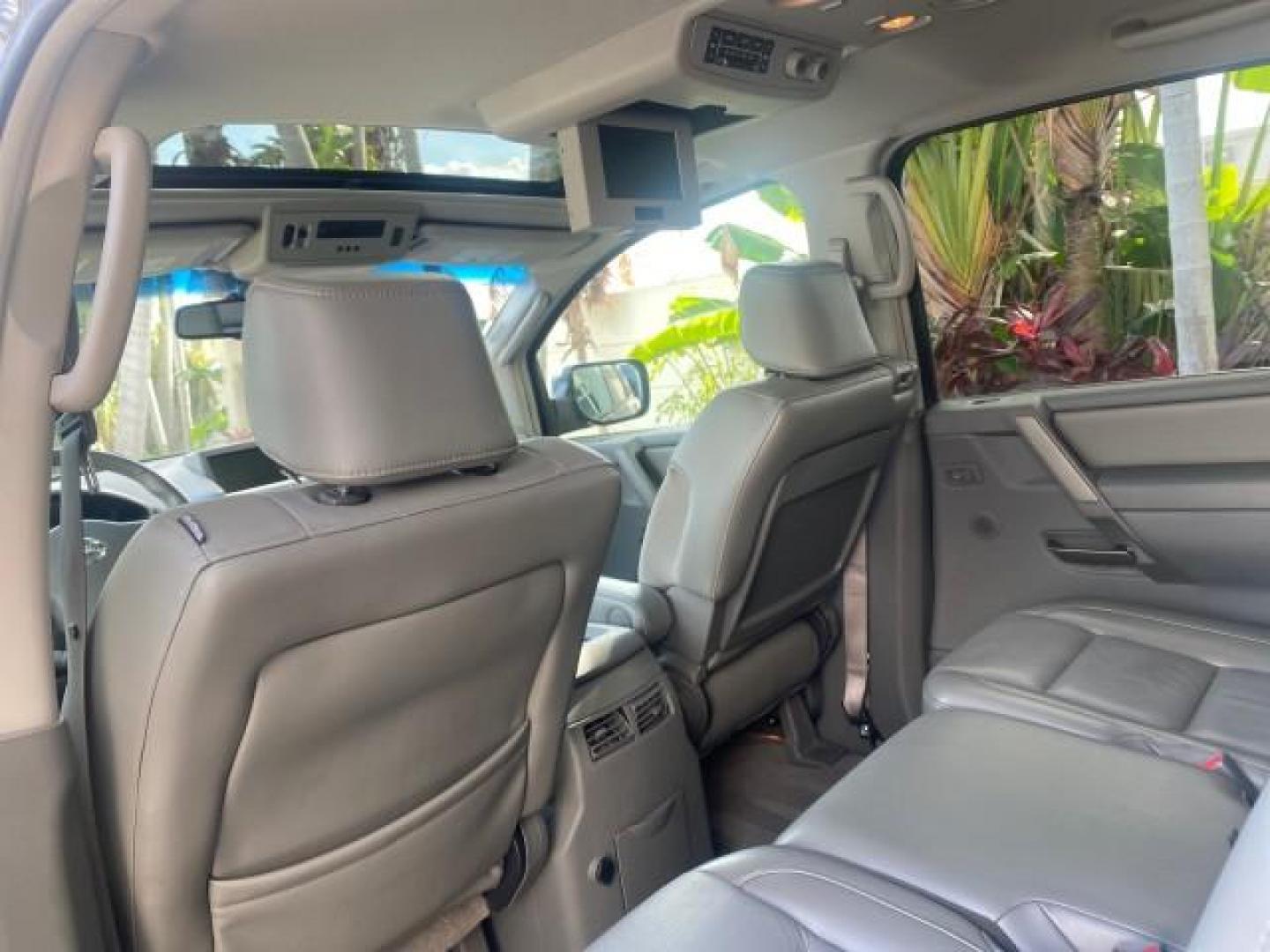 2006 Granite Metallic /Steel/Titanium Nissan Armada SUV 4x4 SE LOW MILES 46,059 1 OWNER (5N1AA08B36N) with an 5.6L DOHC 32-Valve Endurance V8 Engine engine, Automatic transmission, located at 4701 North Dixie Hwy, Pompano Beach, FL, 33064, (954) 422-2889, 26.240938, -80.123474 - OUR WEBPAGE FLORIDACARS1.COM HAS OVER 100 PHOTOS AND FREE CARFAX LINK 2006 NISSAN ARMADA LE LEATHER SUNROOF LOADED TOP OF THE LINE VIN: 5N1AA08B36N727681 5 N 1 A A 0 8 B 3 6 N 7 2 7 6 8 1 4 DOOR WAGON/SPORT UTILITY 5.6L V8 F DOHC 32V GASOLINE 18 MPG REAR WHEEL DRIVE W/ 4X4 Features 4WD/AWD ABS Brake - Photo#89