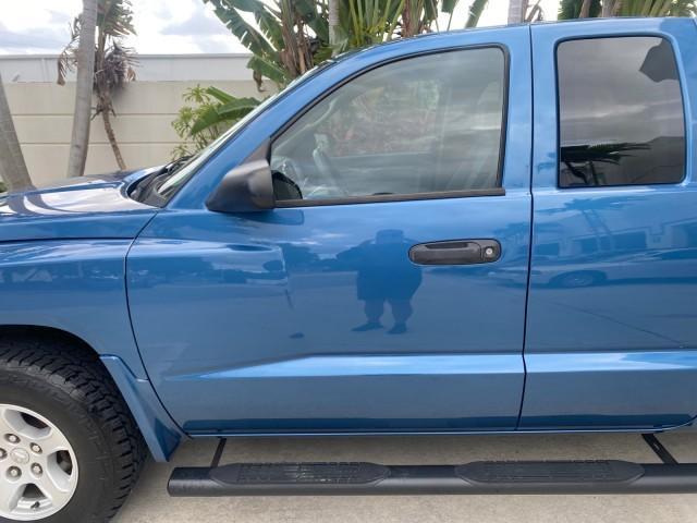 2005 Atlantic Blue Pearl /Med Slate Gray Dodge Dakota SLT LOW MILES 69,842 4WD CLUB (1D7HW42KX5S) with an 3.7L V6 Magnum Engine engine, Automatic transmission, located at 4701 North Dixie Hwy, Pompano Beach, FL, 33064, (954) 422-2889, 26.240938, -80.123474 - OUR WEBPAGE FLORIDACARS1.COM HAS OVER 100 PHOTOS AND FREE CARFAX LINK 2005 DODGE DAKOTA SLT VIN: 1D7HW42KX5S305983 1 D 7 H W 4 2 K X 5 S 3 0 5 9 8 3 CLUB CAB PICKUP 3.7L V6 F GASOLINE 20 MPG REAR WHEEL DRIVE W/ 4X4 Features 4WD/AWD ABS Brakes Air Conditioning Alloy Wheels AM/FM Stereo Automatic Tran - Photo#36