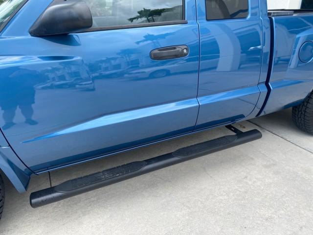 2005 Atlantic Blue Pearl /Med Slate Gray Dodge Dakota SLT LOW MILES 69,842 4WD CLUB (1D7HW42KX5S) with an 3.7L V6 Magnum Engine engine, Automatic transmission, located at 4701 North Dixie Hwy, Pompano Beach, FL, 33064, (954) 422-2889, 26.240938, -80.123474 - OUR WEBPAGE FLORIDACARS1.COM HAS OVER 100 PHOTOS AND FREE CARFAX LINK 2005 DODGE DAKOTA SLT VIN: 1D7HW42KX5S305983 1 D 7 H W 4 2 K X 5 S 3 0 5 9 8 3 CLUB CAB PICKUP 3.7L V6 F GASOLINE 20 MPG REAR WHEEL DRIVE W/ 4X4 Features 4WD/AWD ABS Brakes Air Conditioning Alloy Wheels AM/FM Stereo Automatic Tran - Photo#37