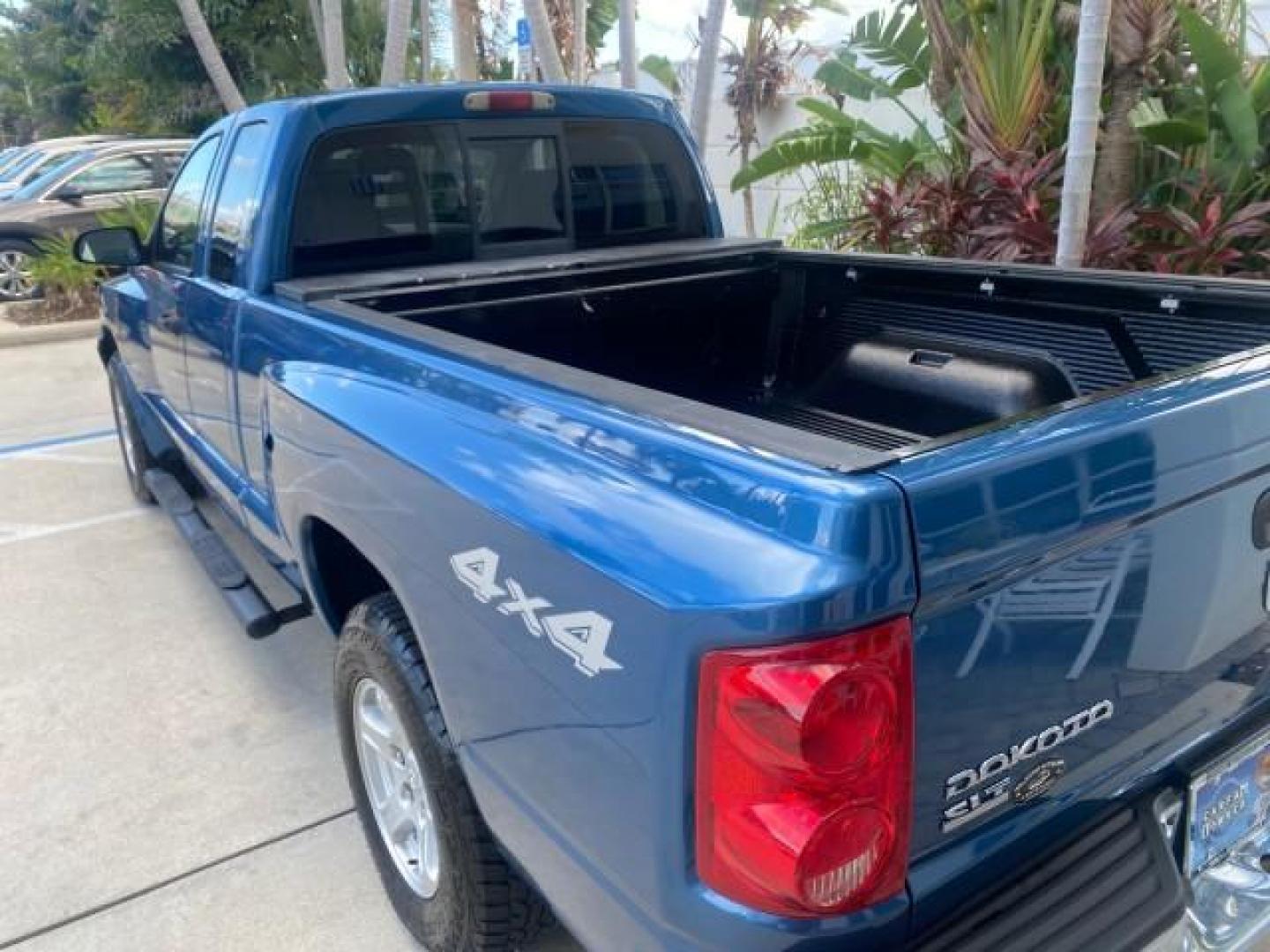 2005 Atlantic Blue Pearl /Med Slate Gray Dodge Dakota SLT LOW MILES 69,842 4WD CLUB (1D7HW42KX5S) with an 3.7L V6 Magnum Engine engine, Automatic transmission, located at 4701 North Dixie Hwy, Pompano Beach, FL, 33064, (954) 422-2889, 26.240938, -80.123474 - OUR WEBPAGE FLORIDACARS1.COM HAS OVER 100 PHOTOS AND FREE CARFAX LINK 2005 DODGE DAKOTA SLT VIN: 1D7HW42KX5S305983 1 D 7 H W 4 2 K X 5 S 3 0 5 9 8 3 CLUB CAB PICKUP 3.7L V6 F GASOLINE 20 MPG REAR WHEEL DRIVE W/ 4X4 Features 4WD/AWD ABS Brakes Air Conditioning Alloy Wheels AM/FM Stereo Automatic Tran- Photo#88