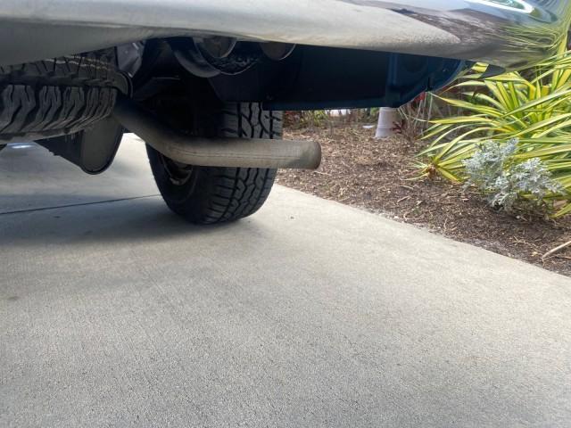 2005 Atlantic Blue Pearl /Med Slate Gray Dodge Dakota SLT LOW MILES 69,842 4WD CLUB (1D7HW42KX5S) with an 3.7L V6 Magnum Engine engine, Automatic transmission, located at 4701 North Dixie Hwy, Pompano Beach, FL, 33064, (954) 422-2889, 26.240938, -80.123474 - OUR WEBPAGE FLORIDACARS1.COM HAS OVER 100 PHOTOS AND FREE CARFAX LINK 2005 DODGE DAKOTA SLT VIN: 1D7HW42KX5S305983 1 D 7 H W 4 2 K X 5 S 3 0 5 9 8 3 CLUB CAB PICKUP 3.7L V6 F GASOLINE 20 MPG REAR WHEEL DRIVE W/ 4X4 Features 4WD/AWD ABS Brakes Air Conditioning Alloy Wheels AM/FM Stereo Automatic Tran - Photo#93