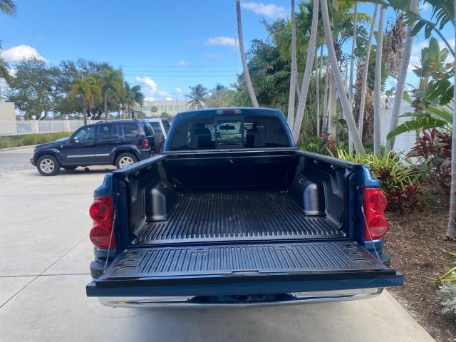 2005 Atlantic Blue Pearl /Med Slate Gray Dodge Dakota SLT LOW MILES 69,842 4WD CLUB (1D7HW42KX5S) with an 3.7L V6 Magnum Engine engine, Automatic transmission, located at 4701 North Dixie Hwy, Pompano Beach, FL, 33064, (954) 422-2889, 26.240938, -80.123474 - OUR WEBPAGE FLORIDACARS1.COM HAS OVER 100 PHOTOS AND FREE CARFAX LINK 2005 DODGE DAKOTA SLT VIN: 1D7HW42KX5S305983 1 D 7 H W 4 2 K X 5 S 3 0 5 9 8 3 CLUB CAB PICKUP 3.7L V6 F GASOLINE 20 MPG REAR WHEEL DRIVE W/ 4X4 Features 4WD/AWD ABS Brakes Air Conditioning Alloy Wheels AM/FM Stereo Automatic Tran - Photo#94