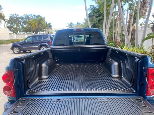 2005 Atlantic Blue Pearl /Med Slate Gray Dodge Dakota SLT LOW MILES 69,842 4WD CLUB (1D7HW42KX5S) with an 3.7L V6 Magnum Engine engine, Automatic transmission, located at 4701 North Dixie Hwy, Pompano Beach, FL, 33064, (954) 422-2889, 26.240938, -80.123474 - OUR WEBPAGE FLORIDACARS1.COM HAS OVER 100 PHOTOS AND FREE CARFAX LINK 2005 DODGE DAKOTA SLT VIN: 1D7HW42KX5S305983 1 D 7 H W 4 2 K X 5 S 3 0 5 9 8 3 CLUB CAB PICKUP 3.7L V6 F GASOLINE 20 MPG REAR WHEEL DRIVE W/ 4X4 Features 4WD/AWD ABS Brakes Air Conditioning Alloy Wheels AM/FM Stereo Automatic Tran - Photo#95