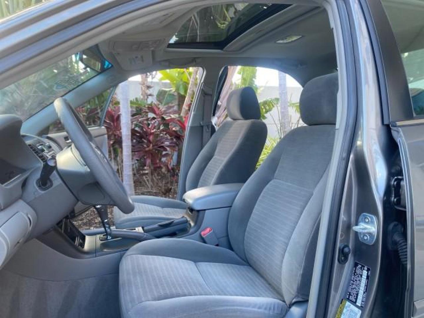 2005 Phantom Gray Pearl /Stone Toyota Camry XLE LOW MILES 68,563 1 OWNER (4T1BF30K05U) with an 3.0L DOHC MPFI Vvti 24-Valve V6 Engine engine, Automatic transmission, located at 4701 North Dixie Hwy, Pompano Beach, FL, 33064, (954) 422-2889, 26.240938, -80.123474 - OUR WEBPAGE FLORIDACARS1.COM HAS OVER 100 PHOTOS AND FREE CARFAX LINK 2005 TOYOTA CAMRY XLE V6 1 OWNER VIN: 4T1BF30K05U621308 4 T 1 B F 3 0 K 0 5 U 6 2 1 3 0 8 SEDAN 4 DR 3.0L V6 F DOHC 24V GASOLINE 28 MPG FRONT WHEEL DRIVE Features ABS Brakes Air Conditioning Alloy Wheels AM/FM Stereo Automatic Tra - Photo#10