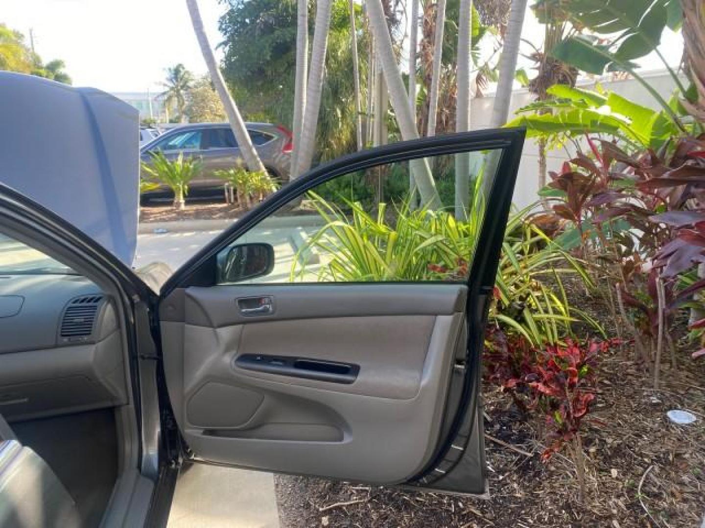 2005 Phantom Gray Pearl /Stone Toyota Camry XLE LOW MILES 68,563 1 OWNER (4T1BF30K05U) with an 3.0L DOHC MPFI Vvti 24-Valve V6 Engine engine, Automatic transmission, located at 4701 North Dixie Hwy, Pompano Beach, FL, 33064, (954) 422-2889, 26.240938, -80.123474 - OUR WEBPAGE FLORIDACARS1.COM HAS OVER 100 PHOTOS AND FREE CARFAX LINK 2005 TOYOTA CAMRY XLE V6 1 OWNER VIN: 4T1BF30K05U621308 4 T 1 B F 3 0 K 0 5 U 6 2 1 3 0 8 SEDAN 4 DR 3.0L V6 F DOHC 24V GASOLINE 28 MPG FRONT WHEEL DRIVE Features ABS Brakes Air Conditioning Alloy Wheels AM/FM Stereo Automatic Tra - Photo#11