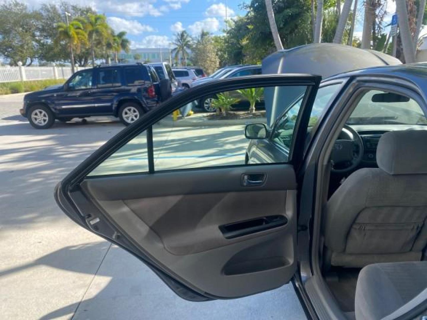2005 Phantom Gray Pearl /Stone Toyota Camry XLE LOW MILES 68,563 1 OWNER (4T1BF30K05U) with an 3.0L DOHC MPFI Vvti 24-Valve V6 Engine engine, Automatic transmission, located at 4701 North Dixie Hwy, Pompano Beach, FL, 33064, (954) 422-2889, 26.240938, -80.123474 - OUR WEBPAGE FLORIDACARS1.COM HAS OVER 100 PHOTOS AND FREE CARFAX LINK 2005 TOYOTA CAMRY XLE V6 1 OWNER VIN: 4T1BF30K05U621308 4 T 1 B F 3 0 K 0 5 U 6 2 1 3 0 8 SEDAN 4 DR 3.0L V6 F DOHC 24V GASOLINE 28 MPG FRONT WHEEL DRIVE Features ABS Brakes Air Conditioning Alloy Wheels AM/FM Stereo Automatic Tra - Photo#13